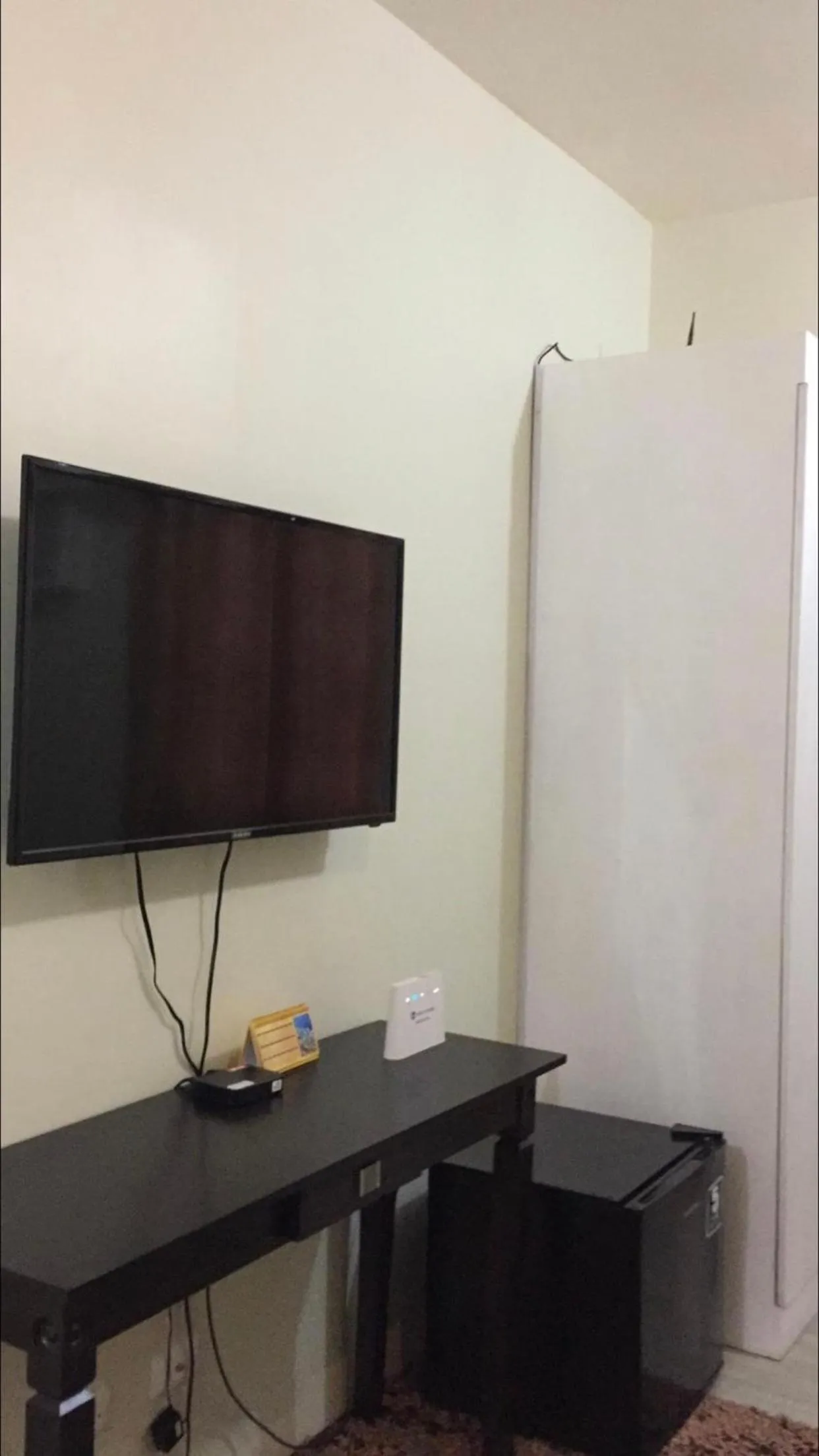 TV and multimedia in Staycation condo with pool near SM Tungko, Bulacan