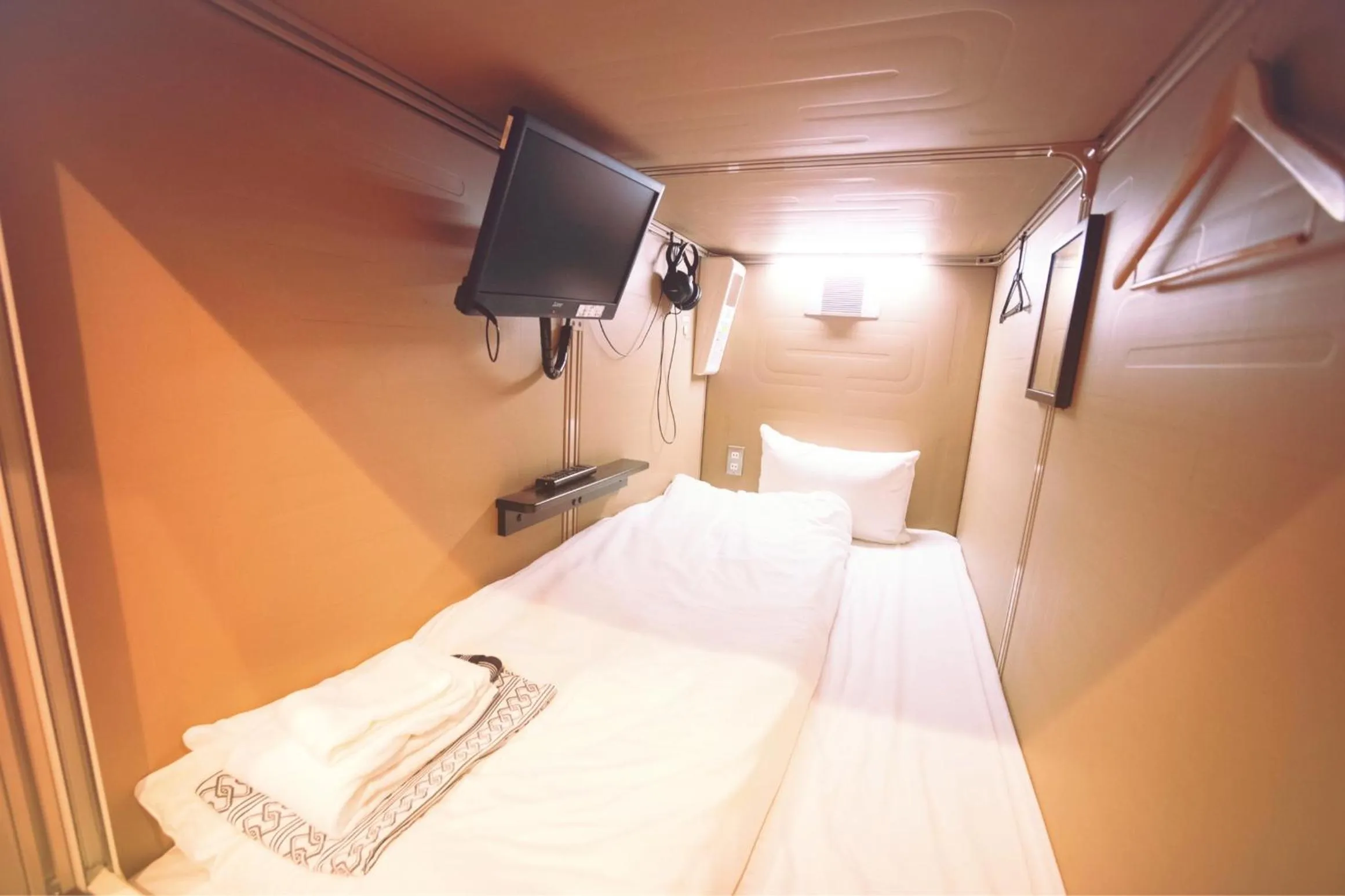 Bed in Hakodate Yunokawa Hotel Amamiyakan