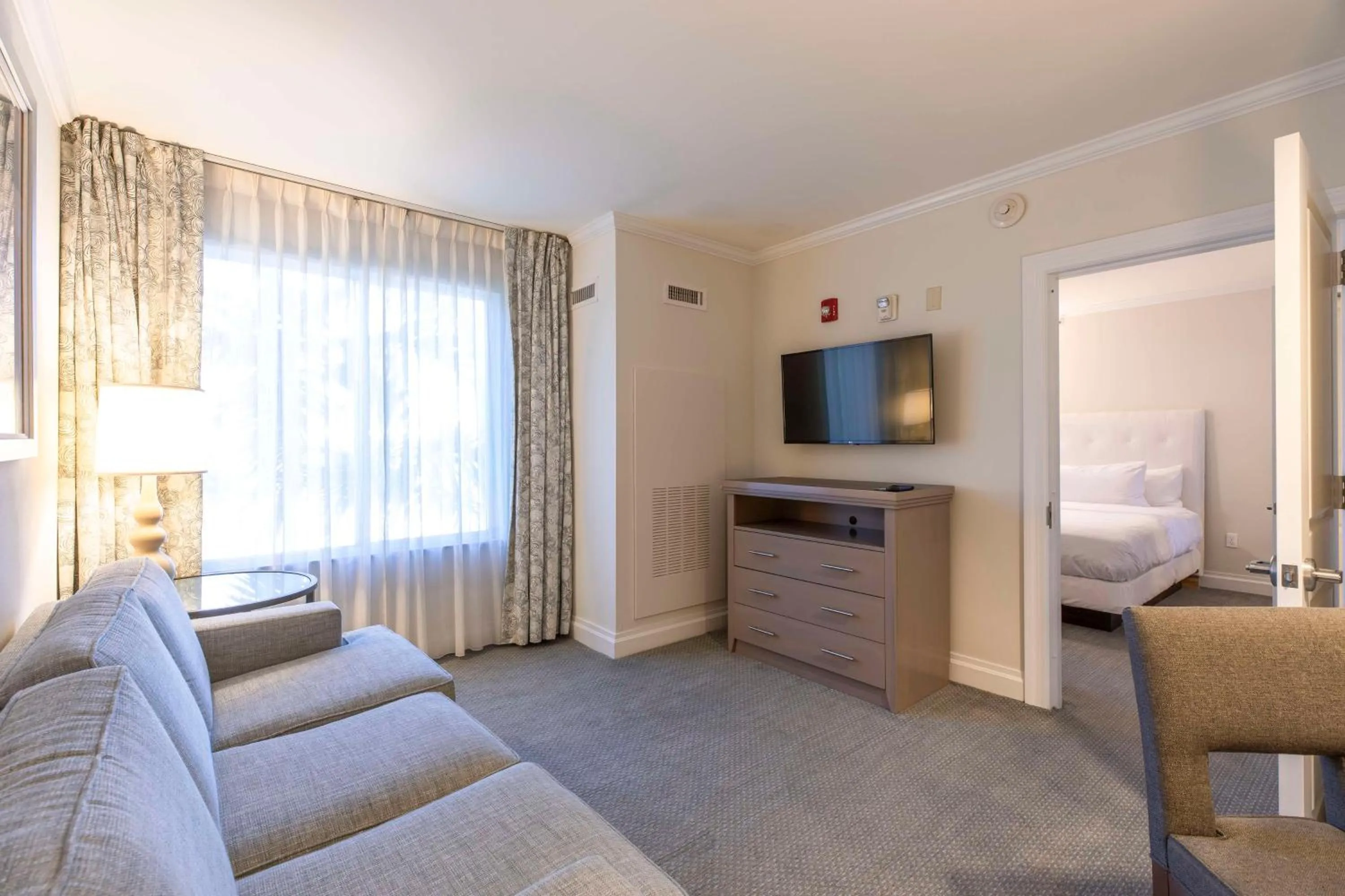 Living room, Bed in Homewood Suites by Hilton Palm Beach Gardens
