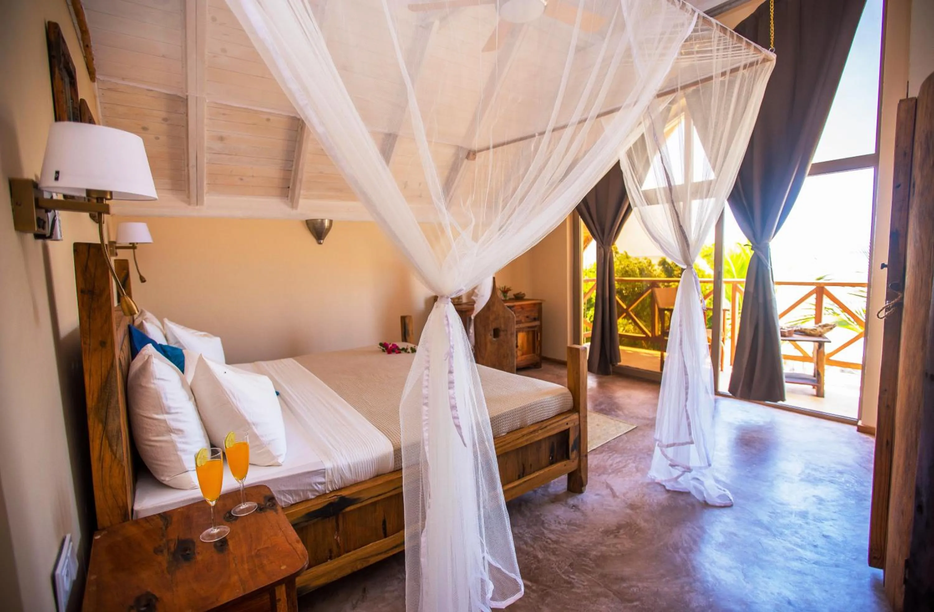 Bed in Clove Island Villas & Spa