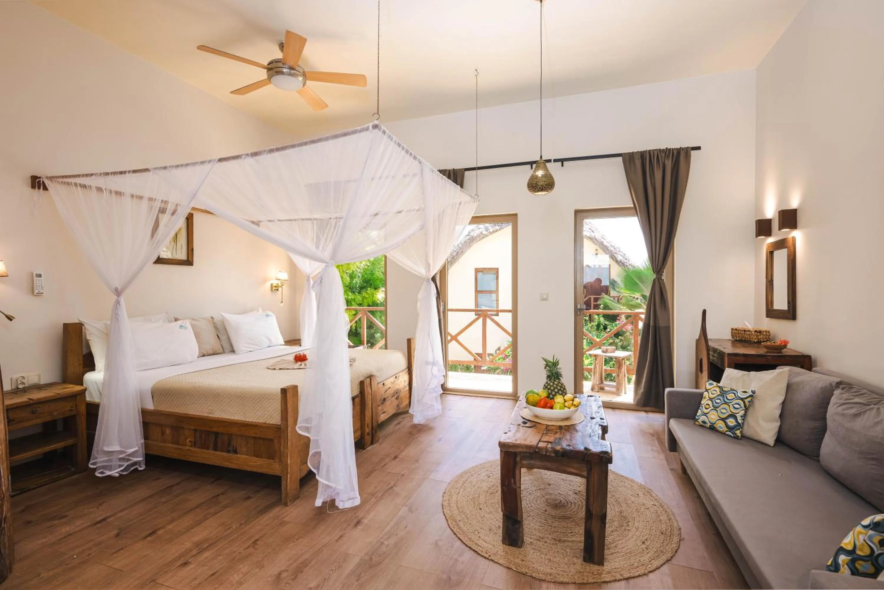 Bed in Clove Island Villas & Spa