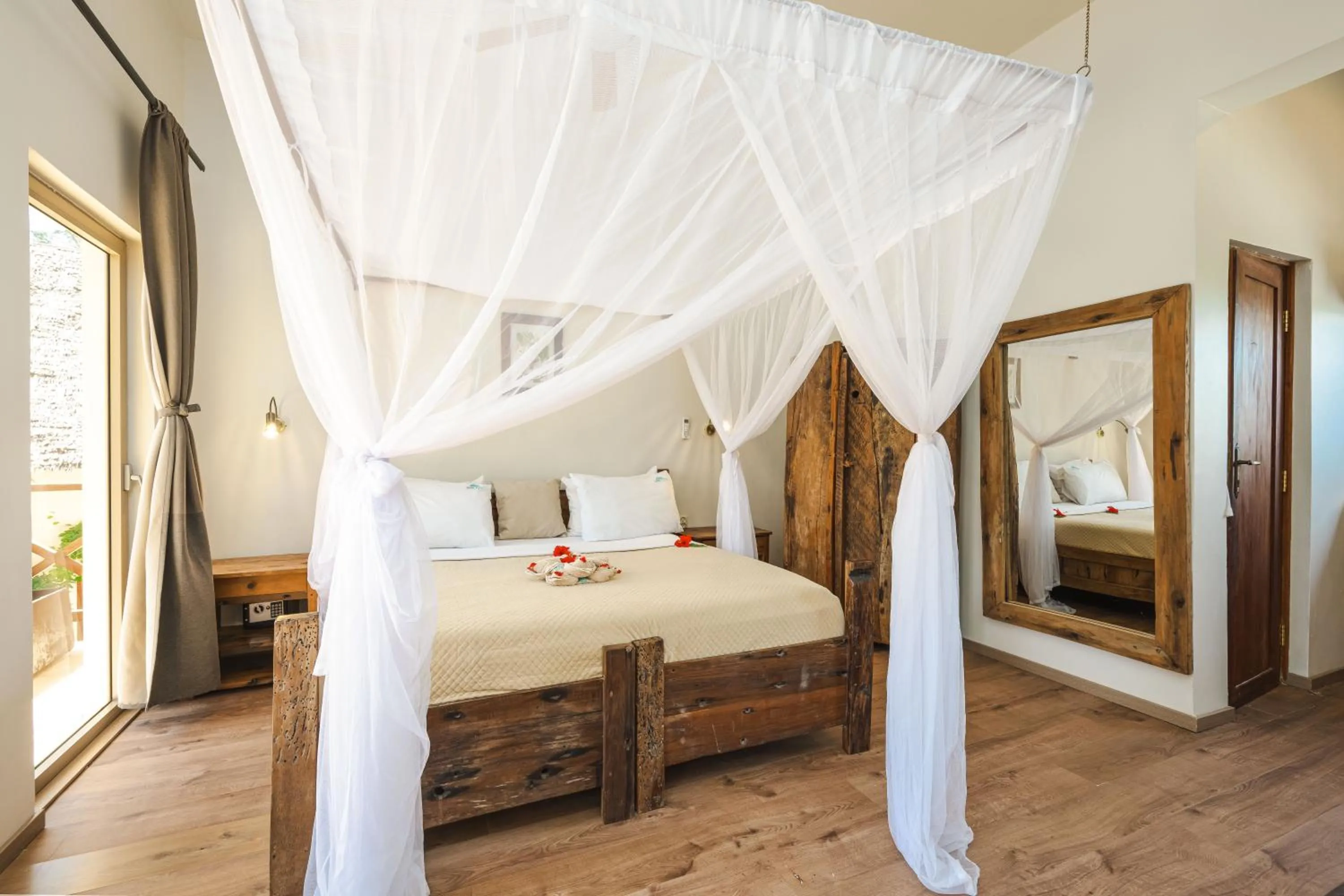 Bed in Clove Island Villas & Spa