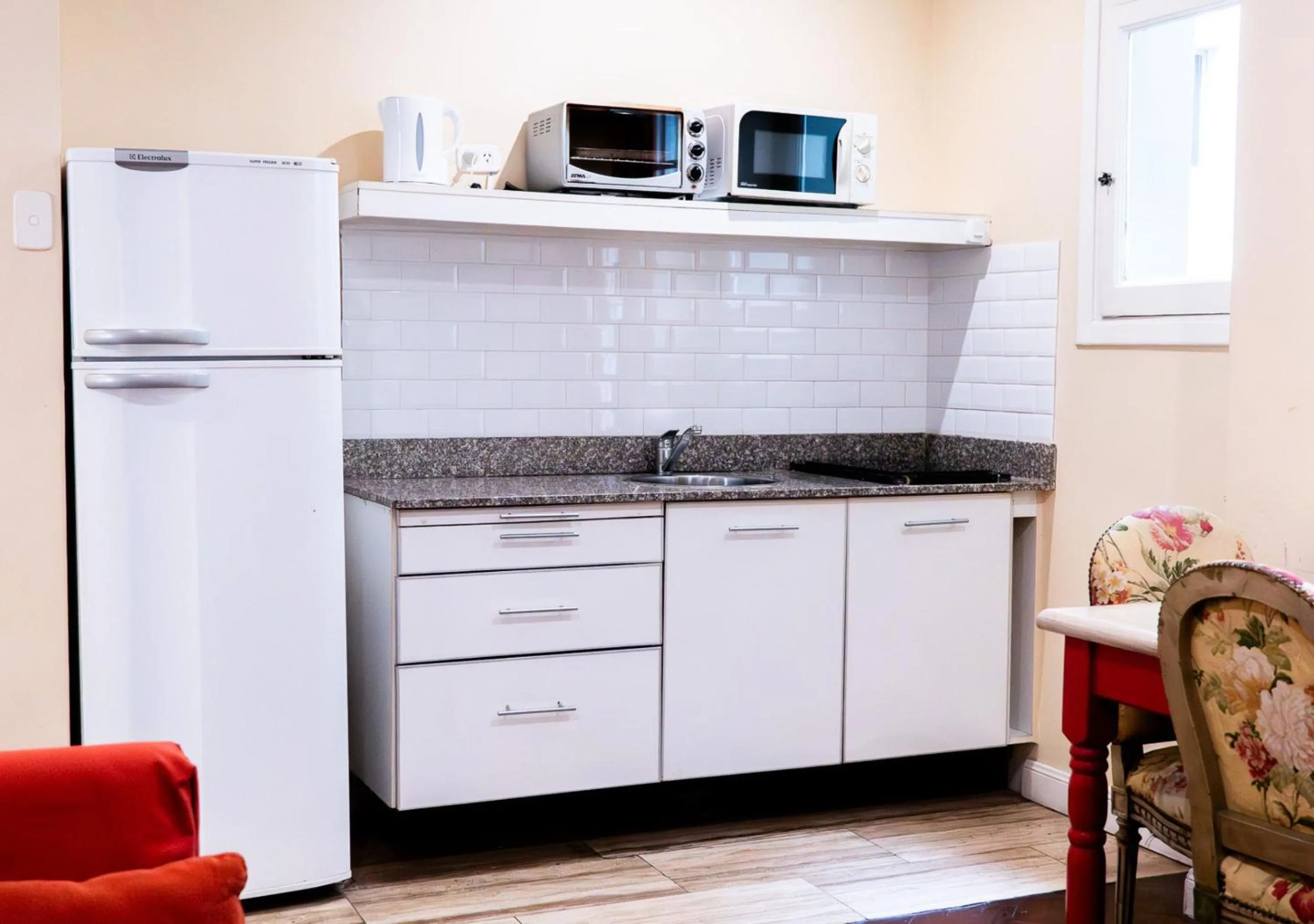 kitchen in Moreno 820 by DOT Suites