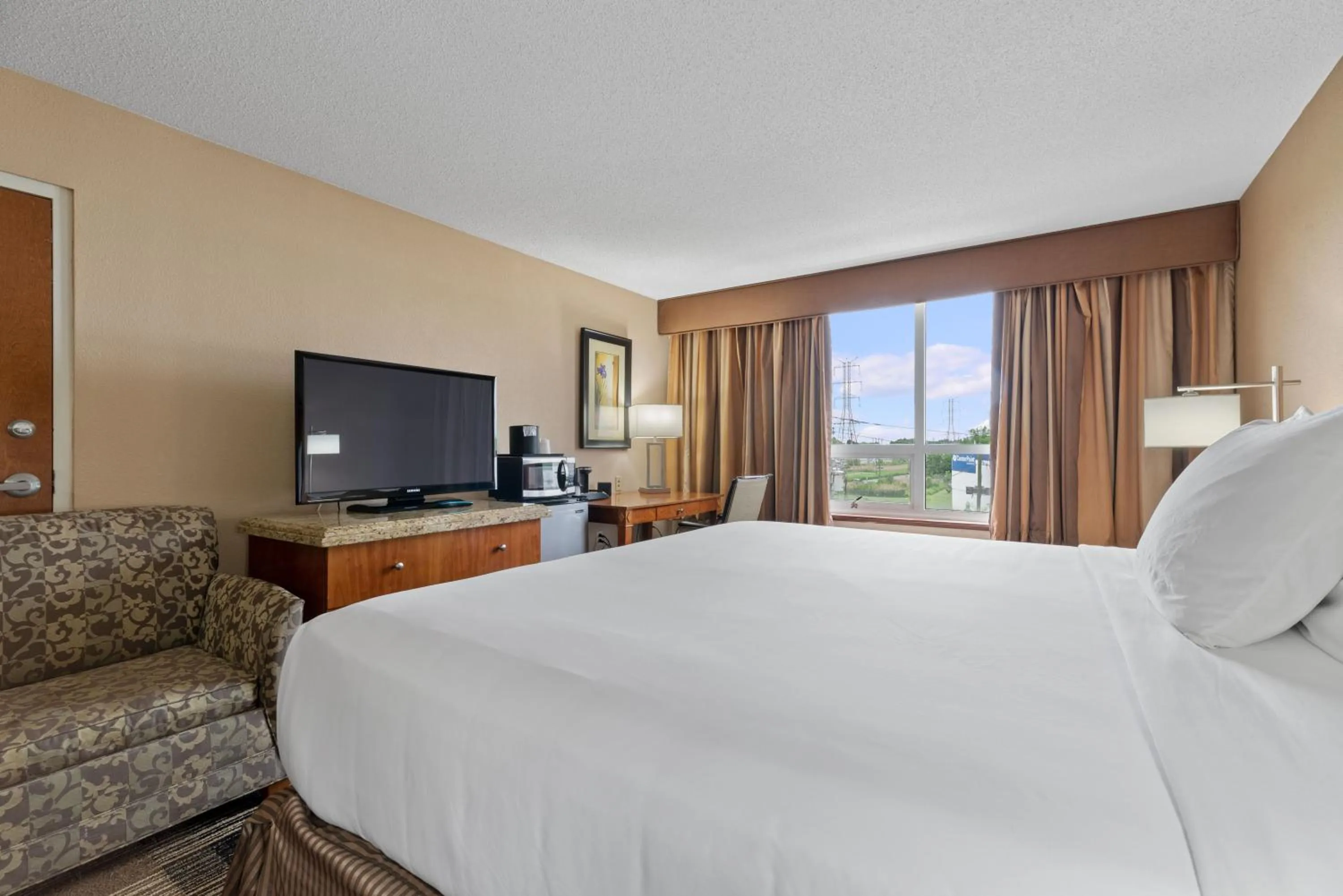 Bed in Hotel Executive Suites