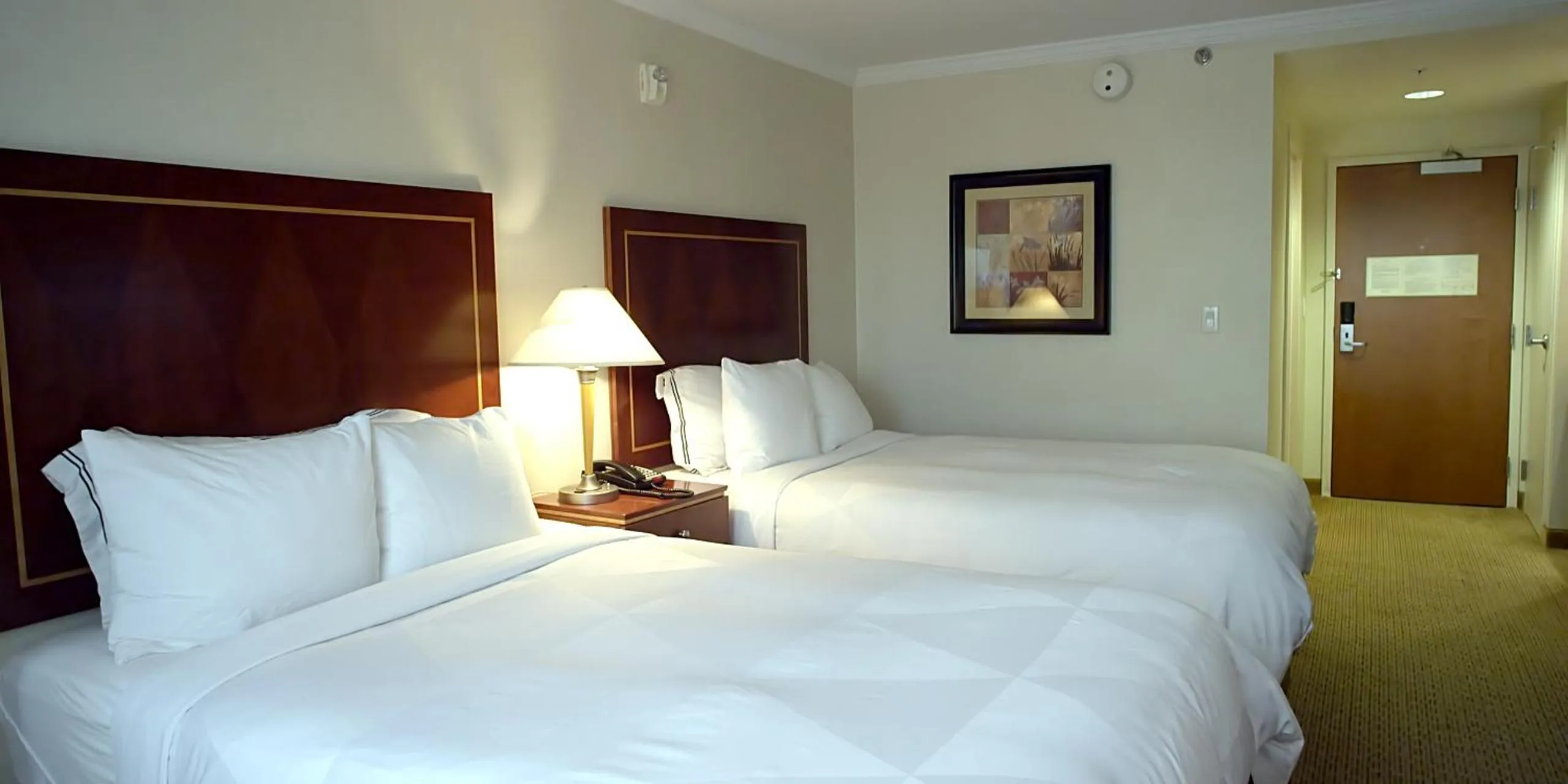 Bed in Hotel Executive Suites