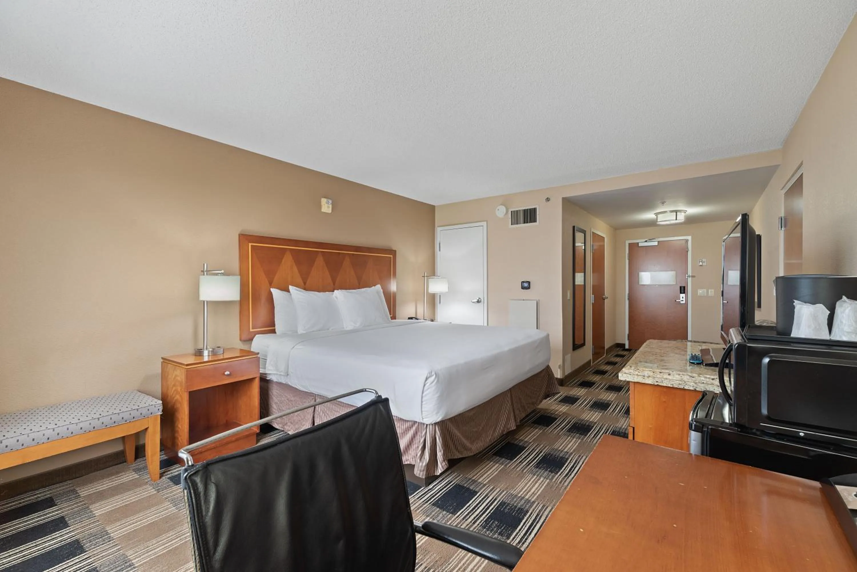 Bed in Hotel Executive Suites