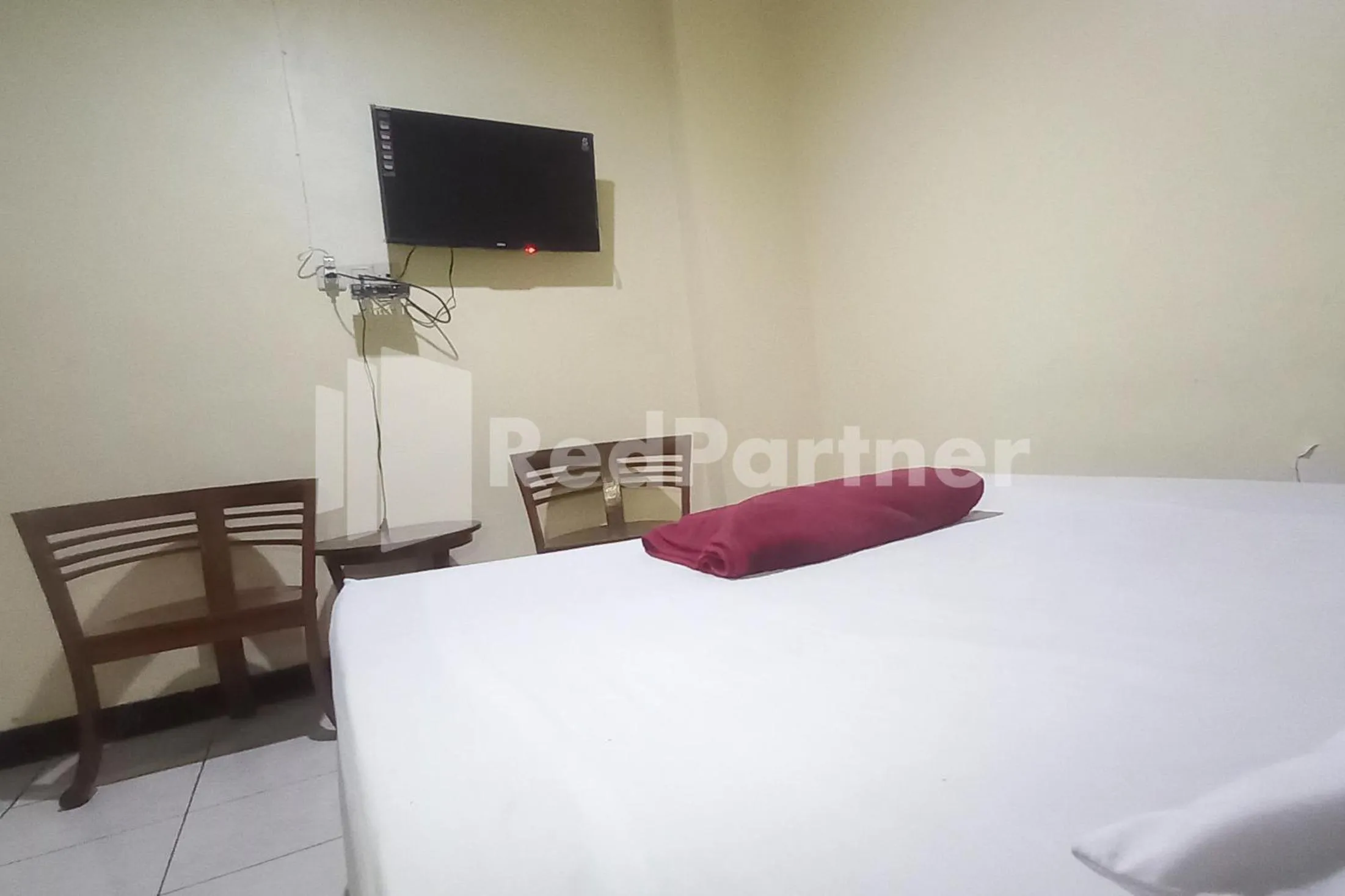 Bedroom, Bed in Hotel Palem 2 Syariah Malang Redpartner