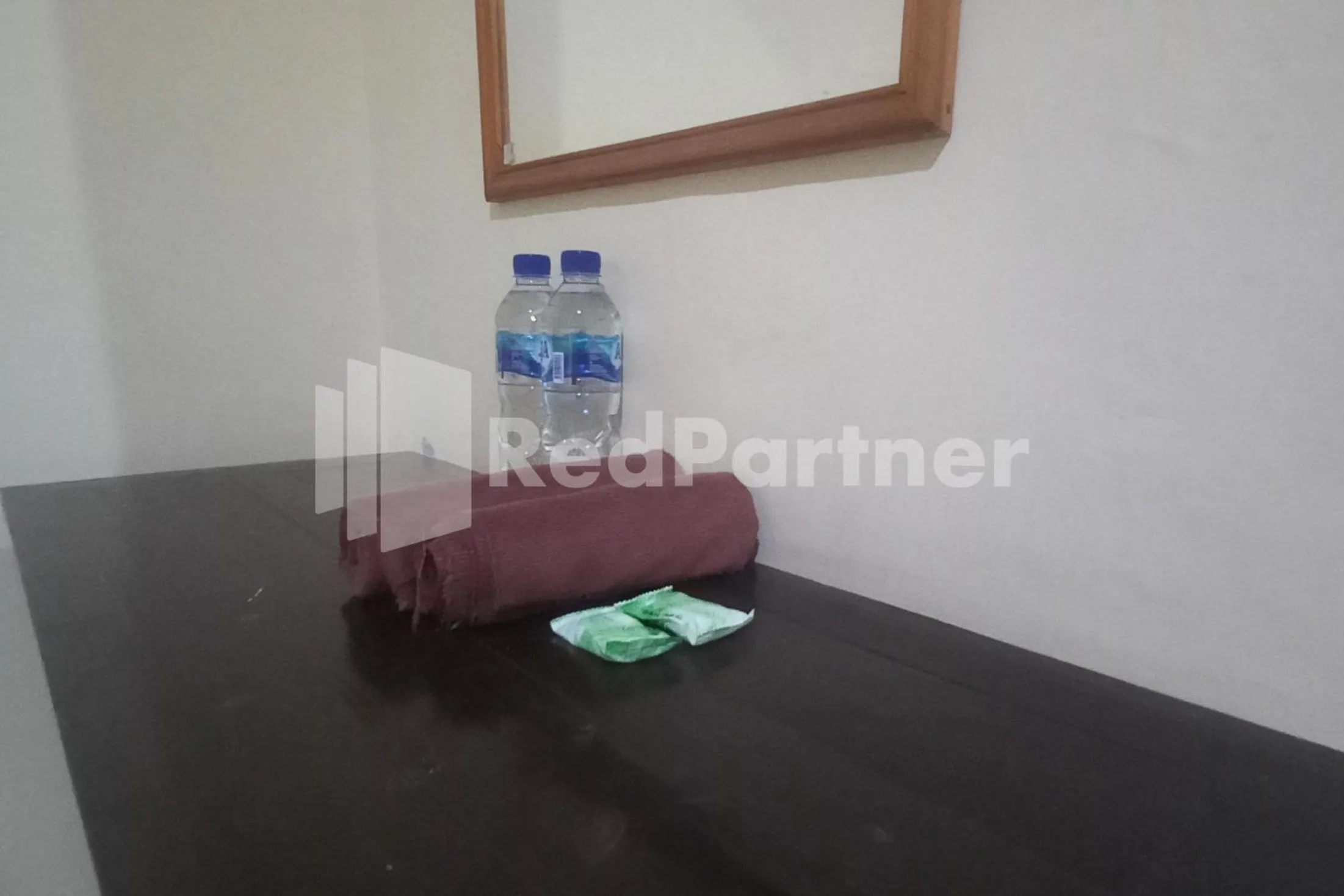 Bedroom in Hotel Palem 2 Syariah Malang Redpartner