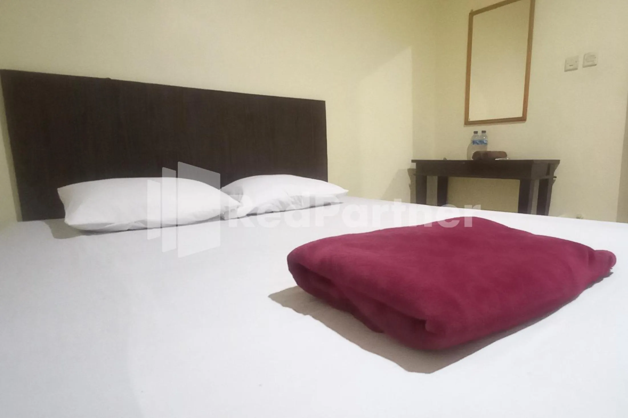 Bedroom, Bed in Hotel Palem 2 Syariah Malang Redpartner