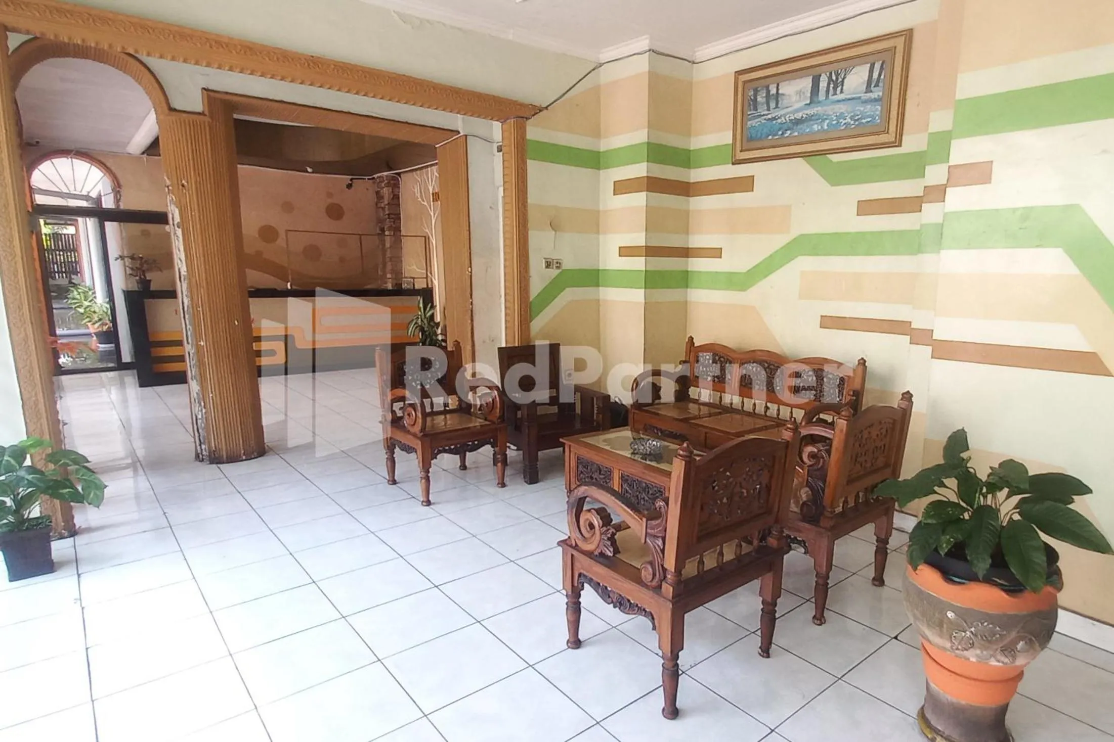 Lobby or reception in Hotel Palem 2 Syariah Malang Redpartner