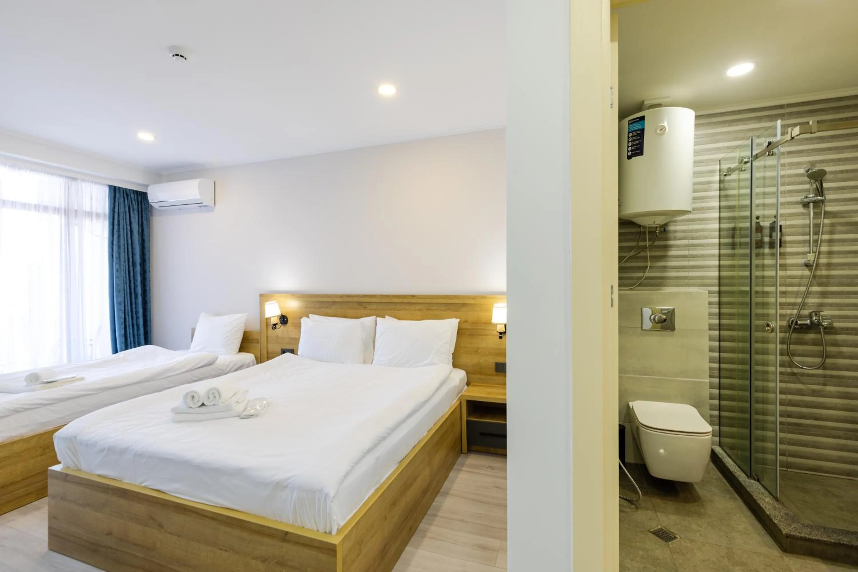 Bathroom, Bed in Aqua Batumi Hotel & Apartments