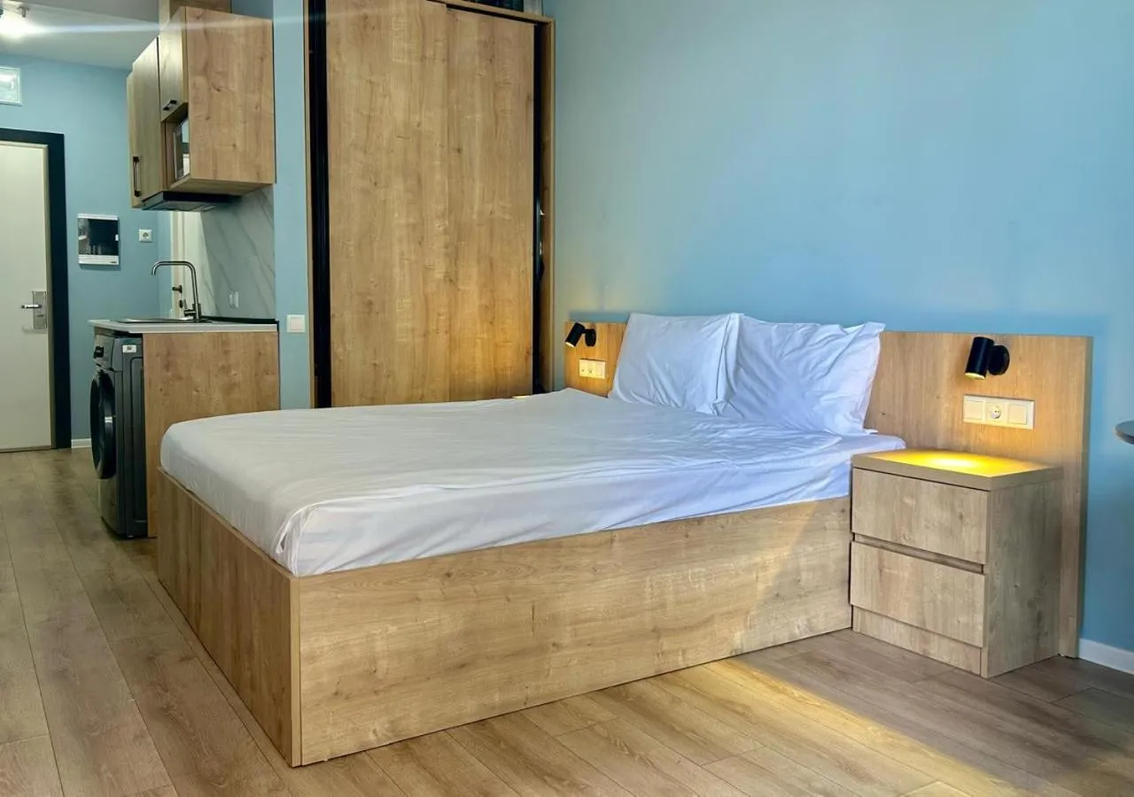 Kitchen or kitchenette, Bed in Aqua Batumi Hotel & Apartments
