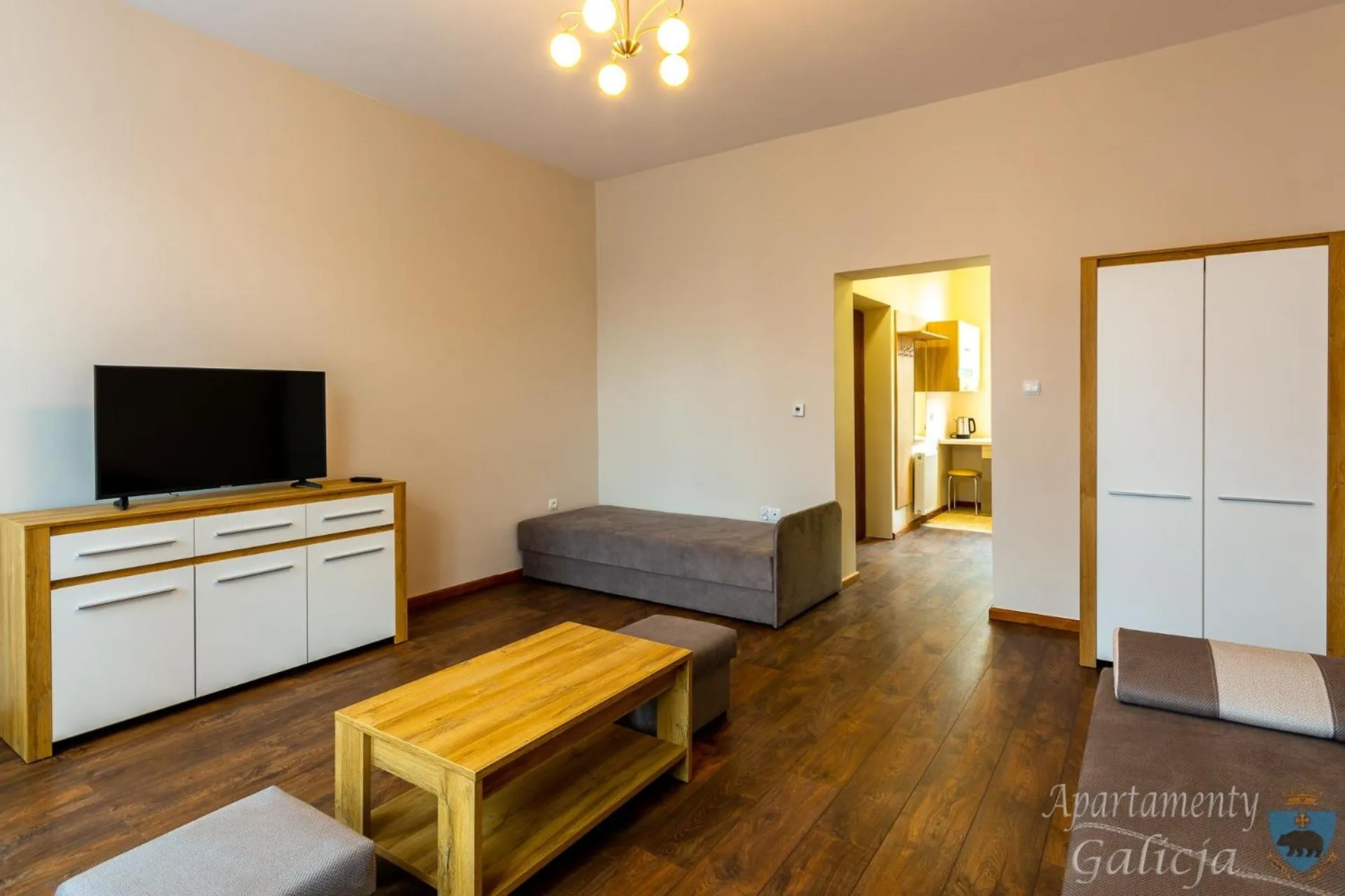 Communal lounge/ TV room in Apartamenty Galicja