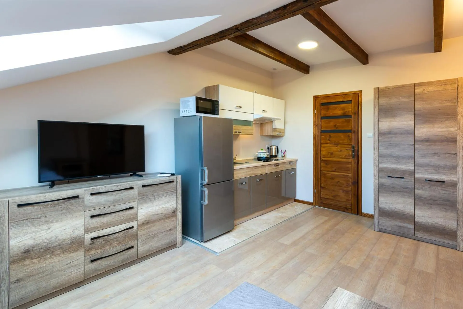 Kitchen or kitchenette in Apartamenty Galicja