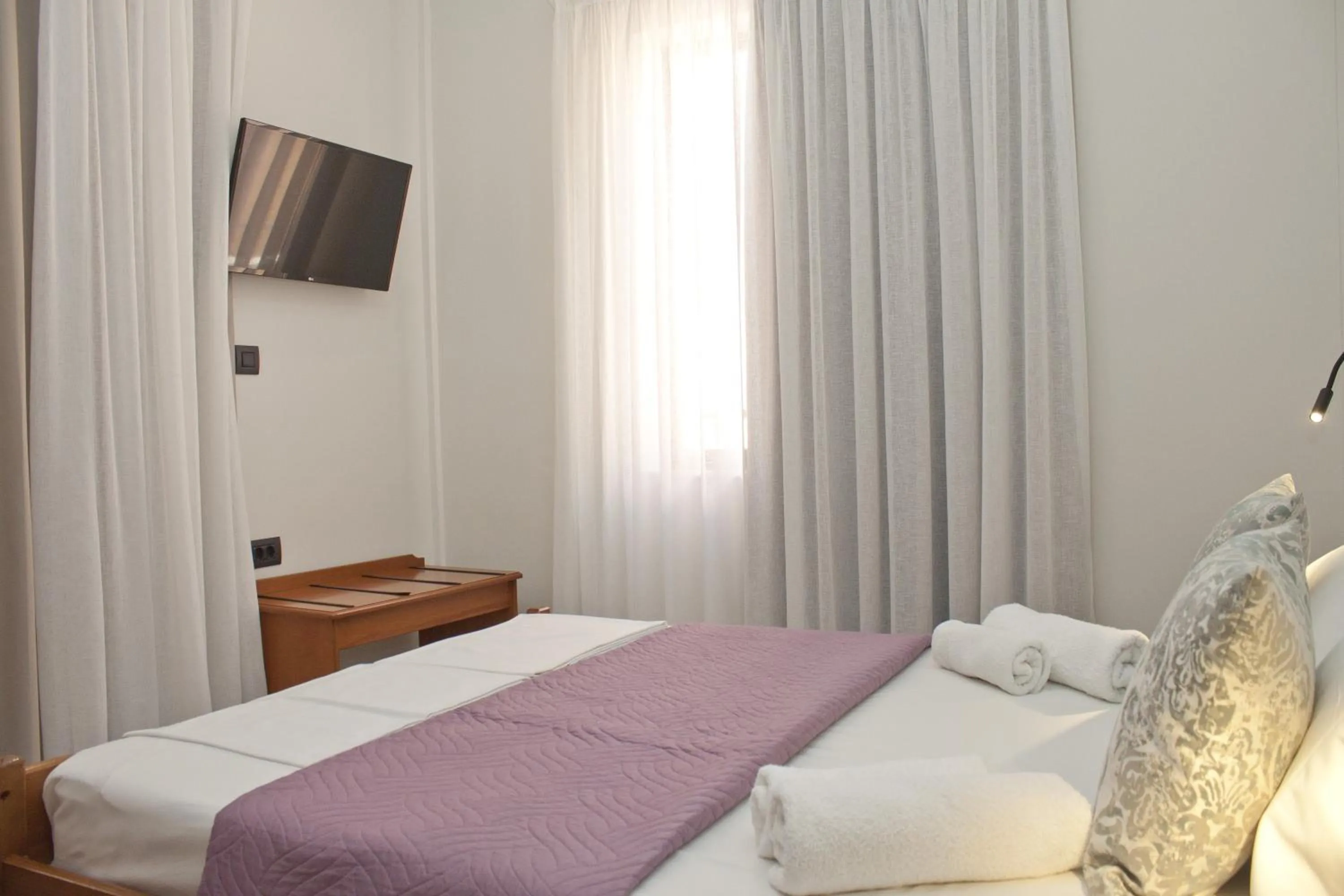 Bed in Vaso Apartments