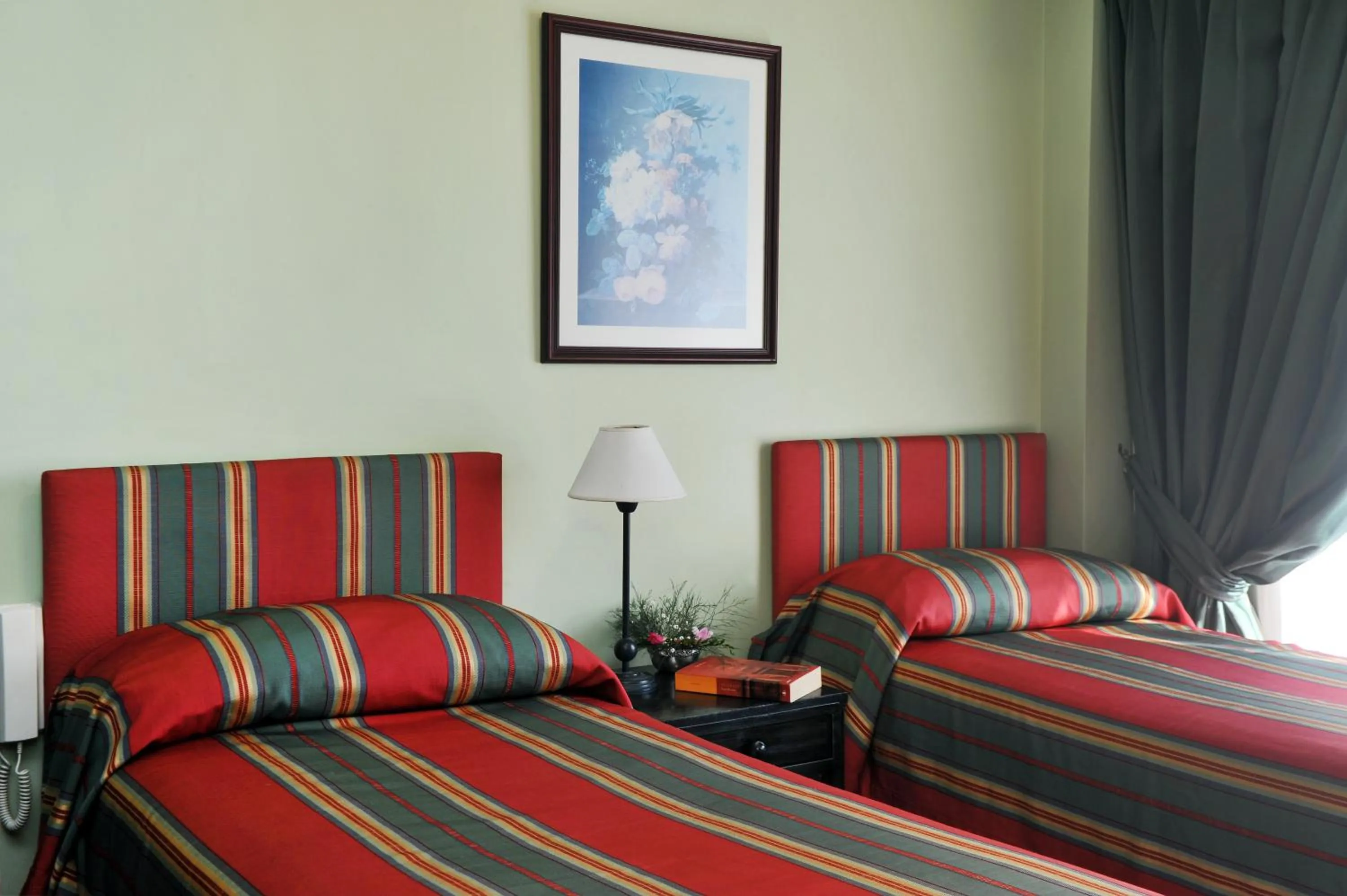 Bed in Mayla Apartments