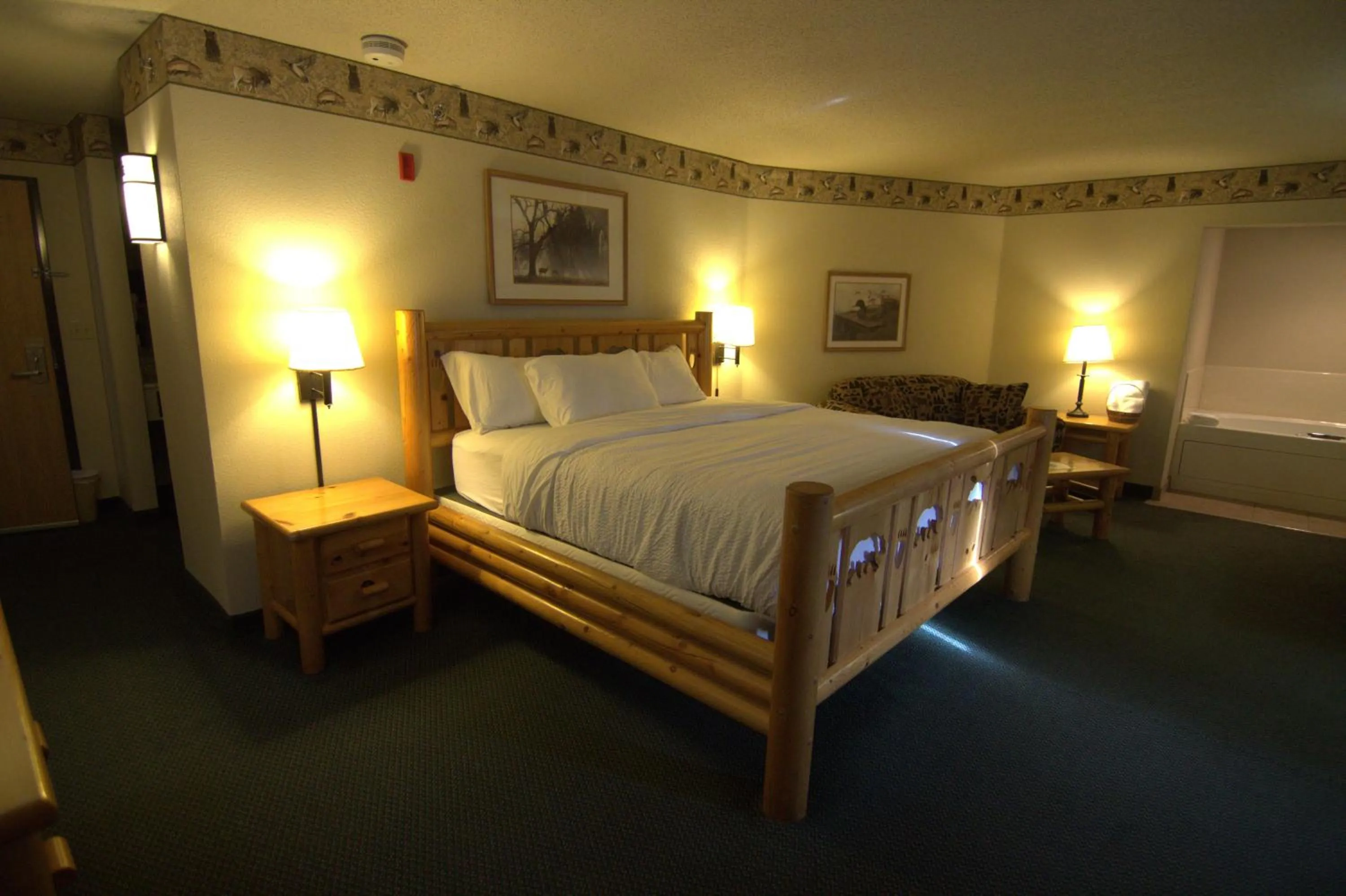 Bed in Shell Lake Lodge, a Travelodge by Wyndham