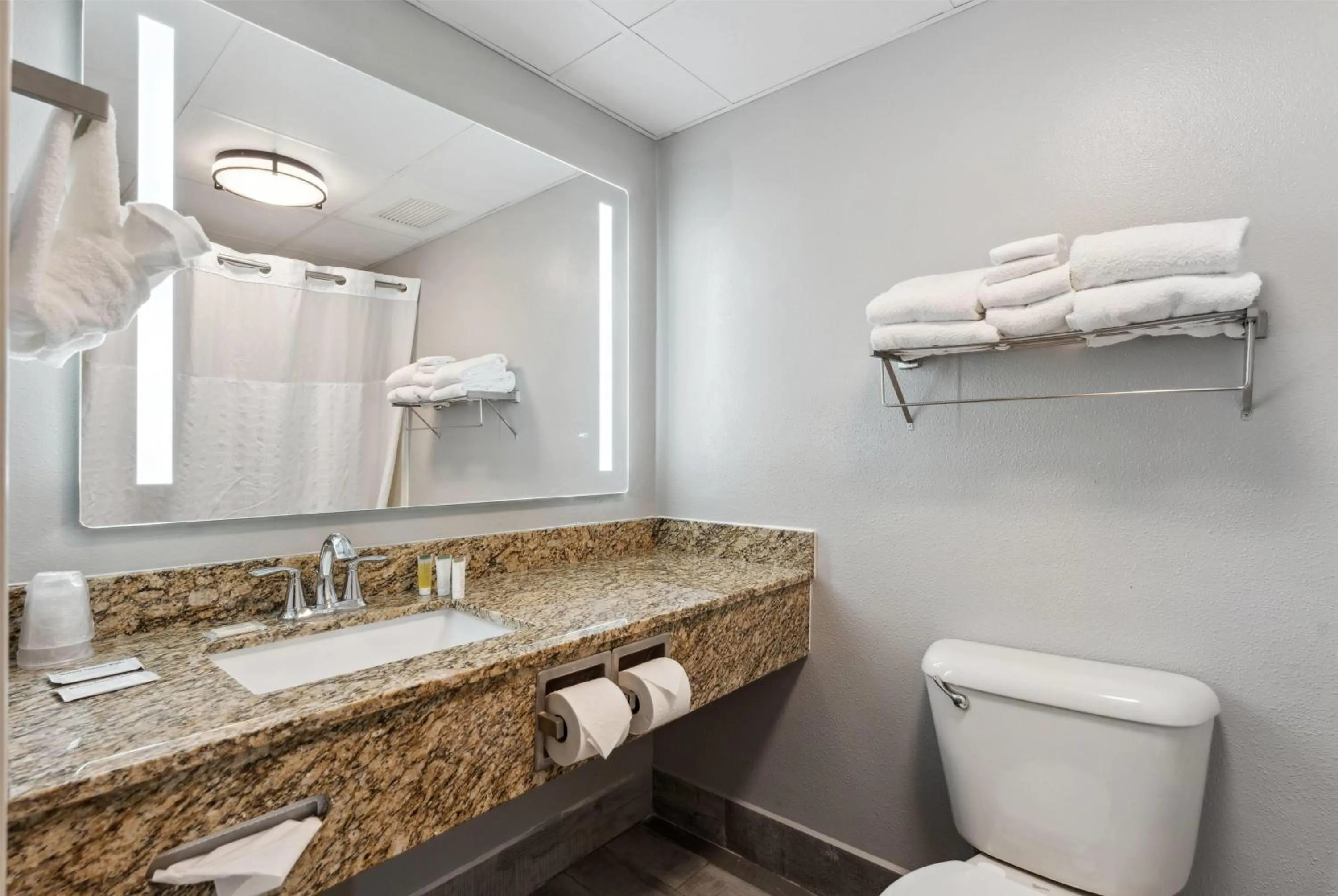 Bathroom in AmericInn by Wyndham Wisconsin Dells