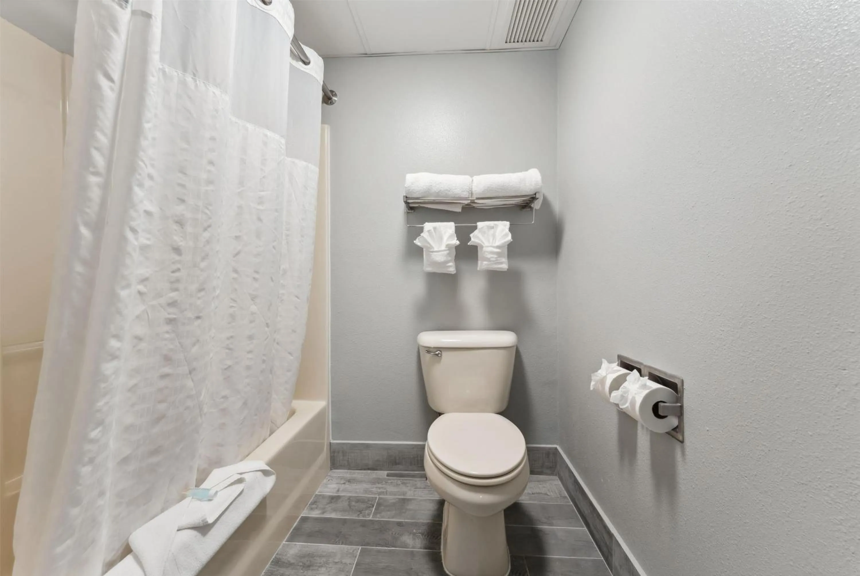 Bathroom in AmericInn by Wyndham Wisconsin Dells