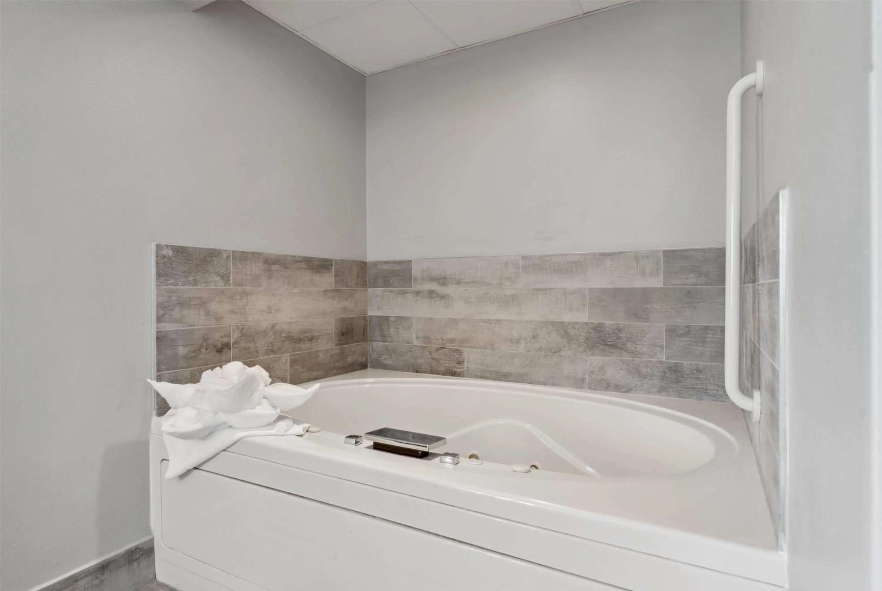 Bathroom in AmericInn by Wyndham Wisconsin Dells