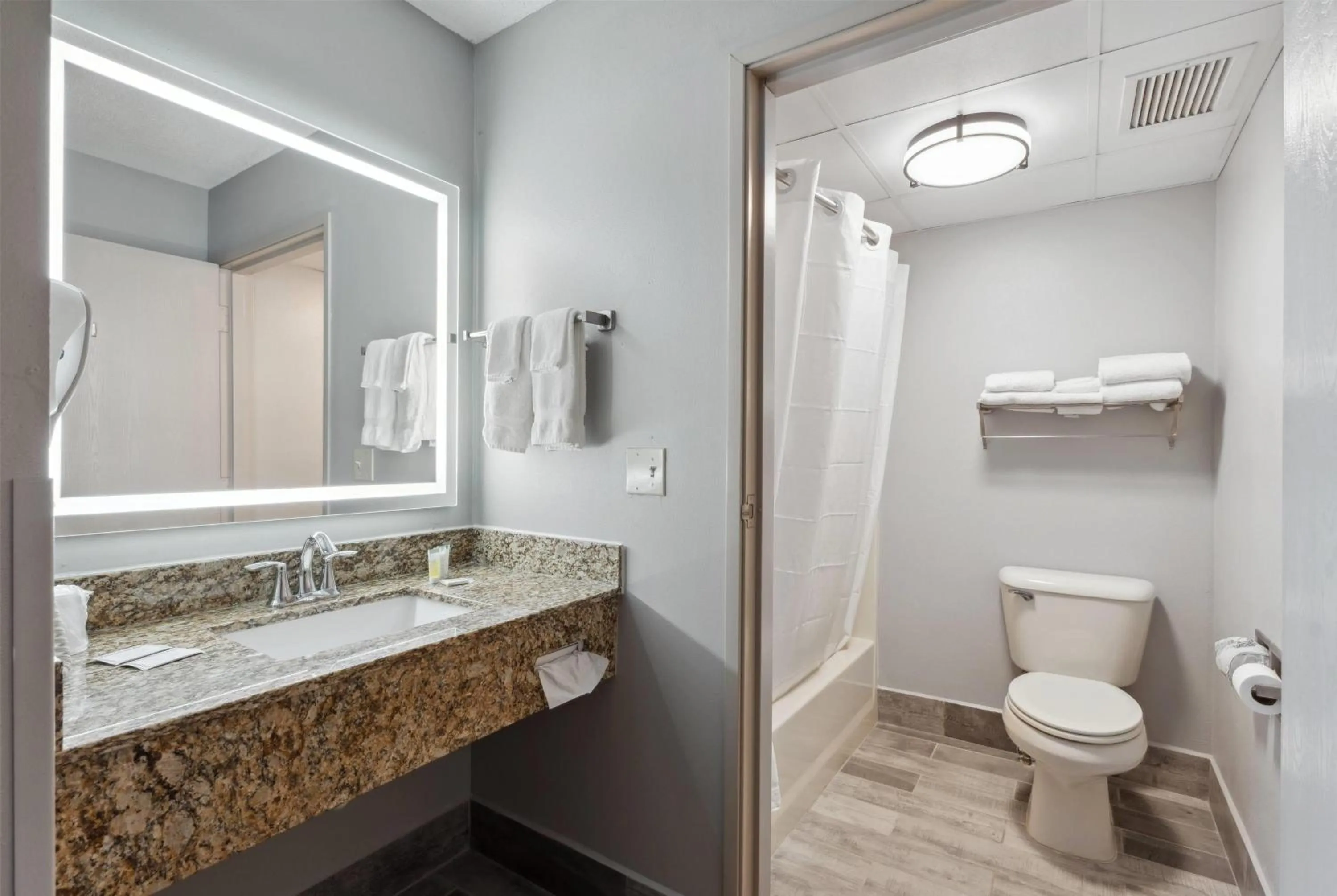 Bathroom in AmericInn by Wyndham Wisconsin Dells