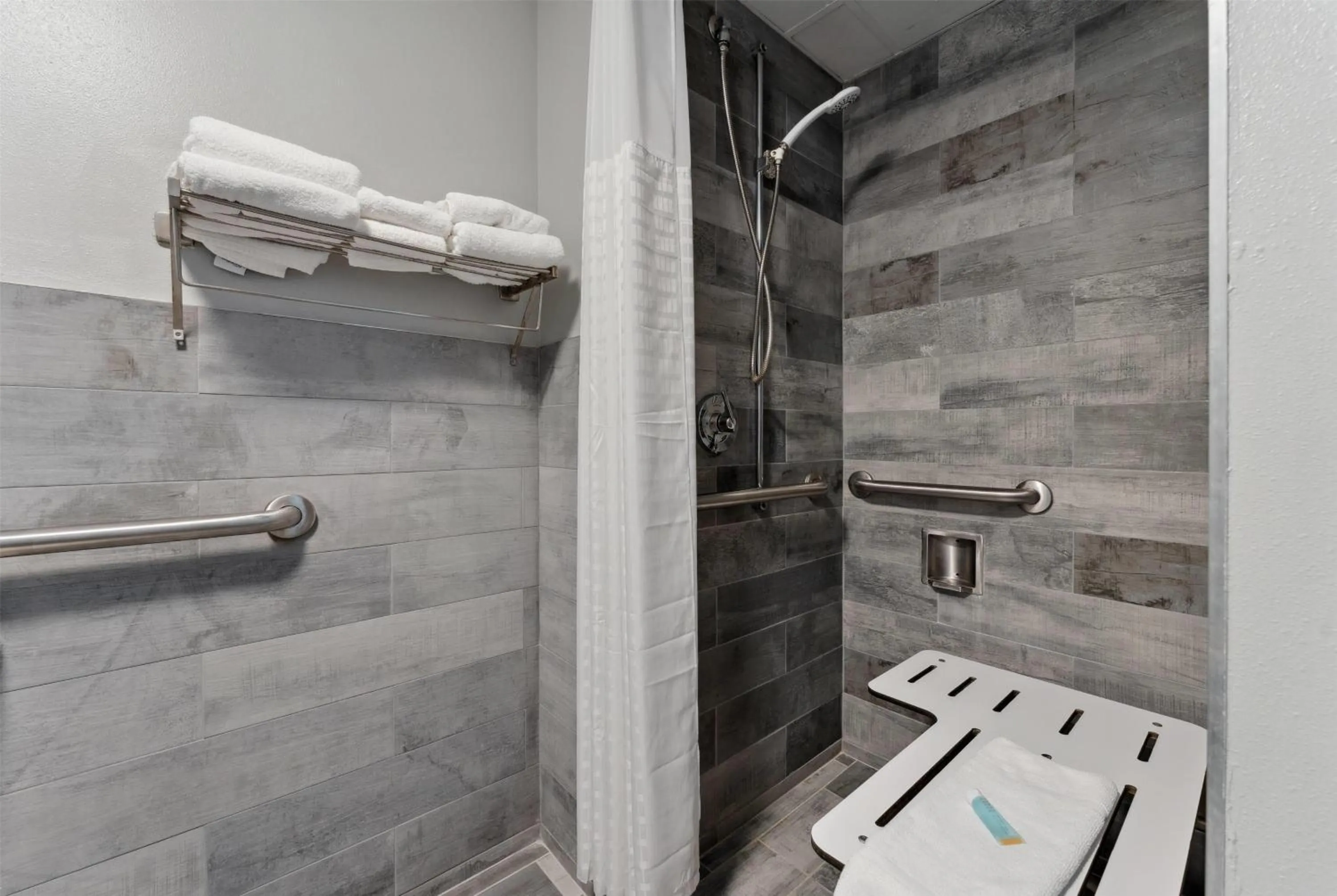 Shower in AmericInn by Wyndham Wisconsin Dells