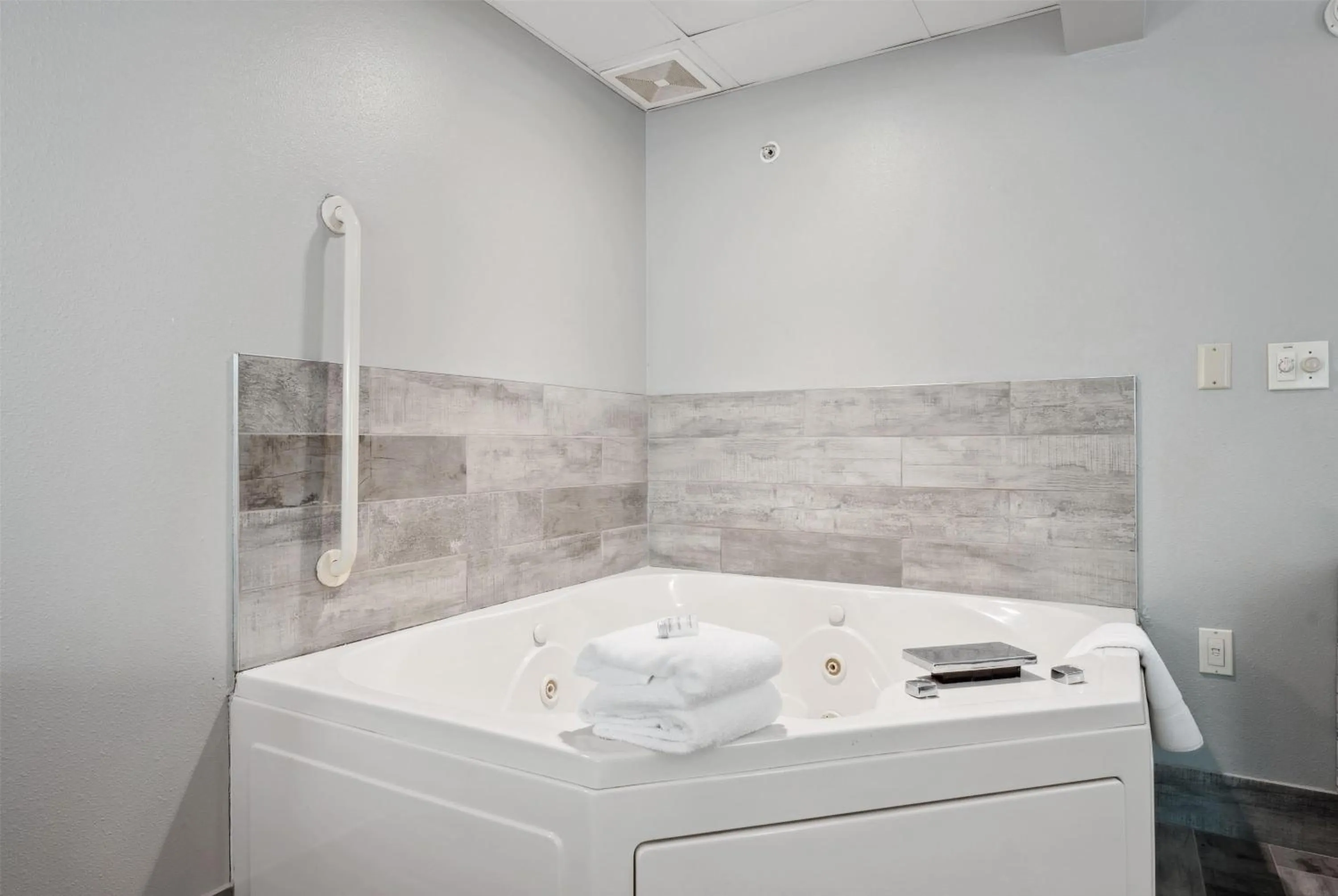 Bedroom in AmericInn by Wyndham Wisconsin Dells