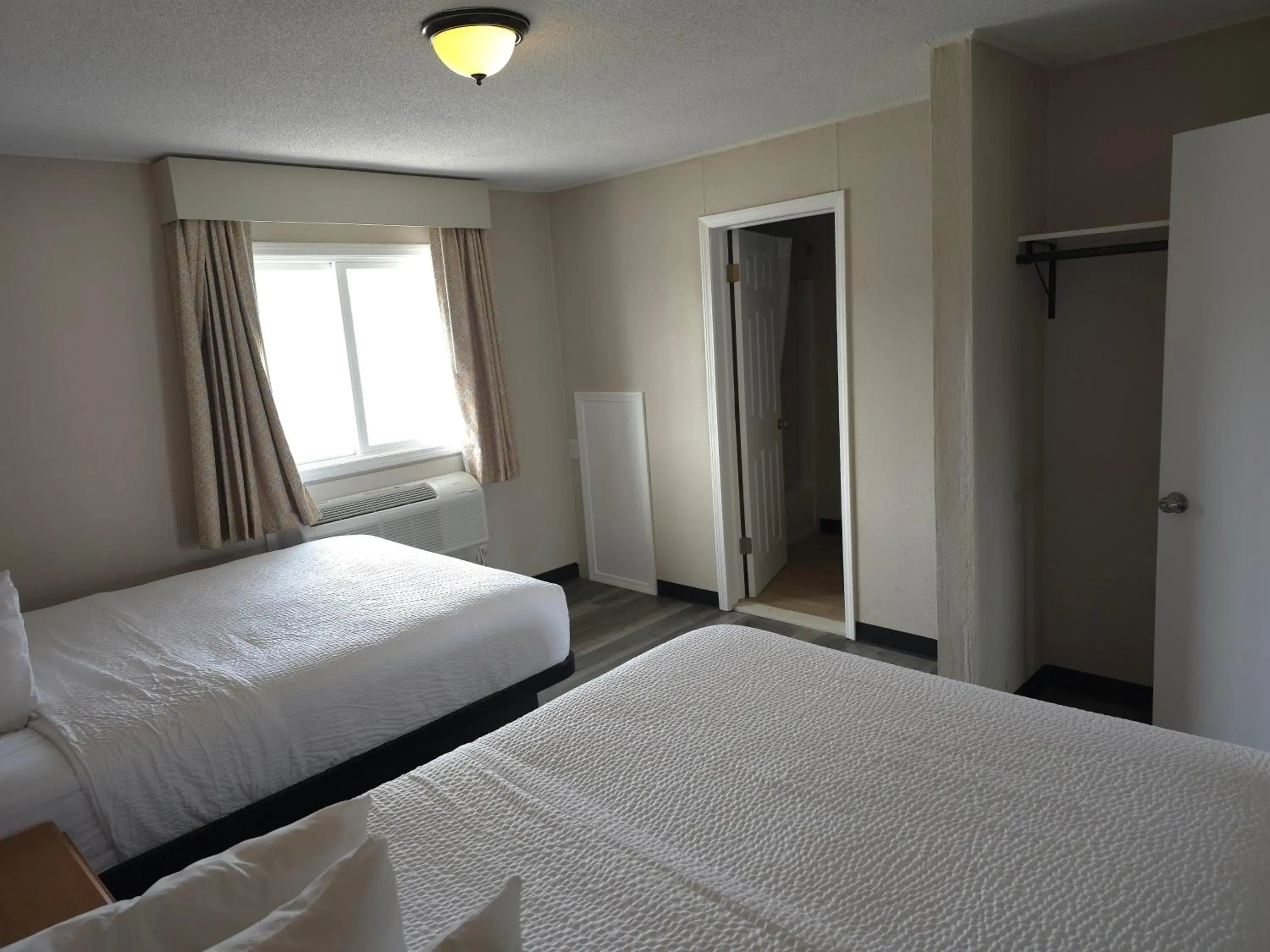 Bed in Days Inn and Suites by Wyndham Port Huron Bed in Days Inn and Suites by Wyndham Port Huron
