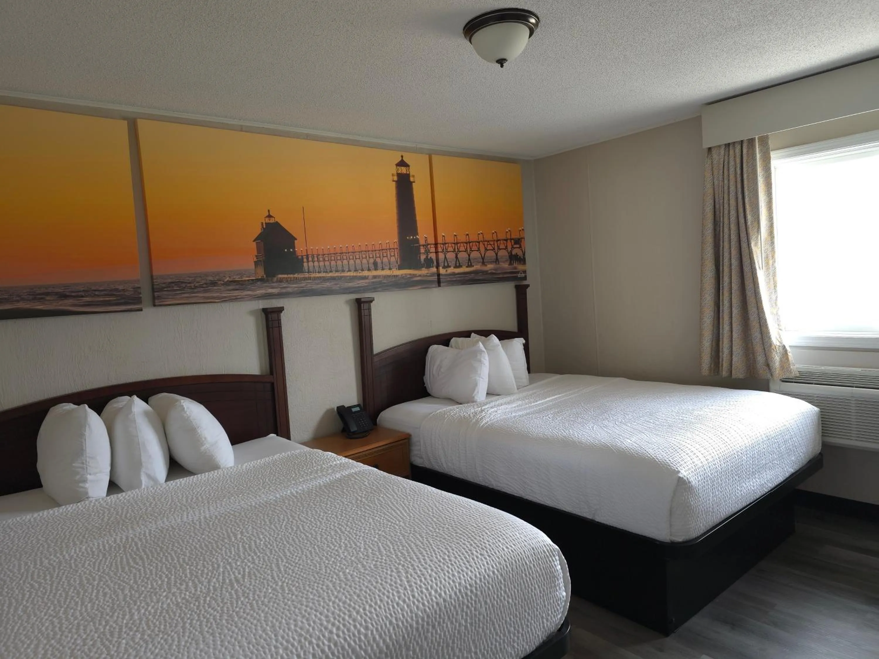 Bed in Days Inn and Suites by Wyndham Port Huron