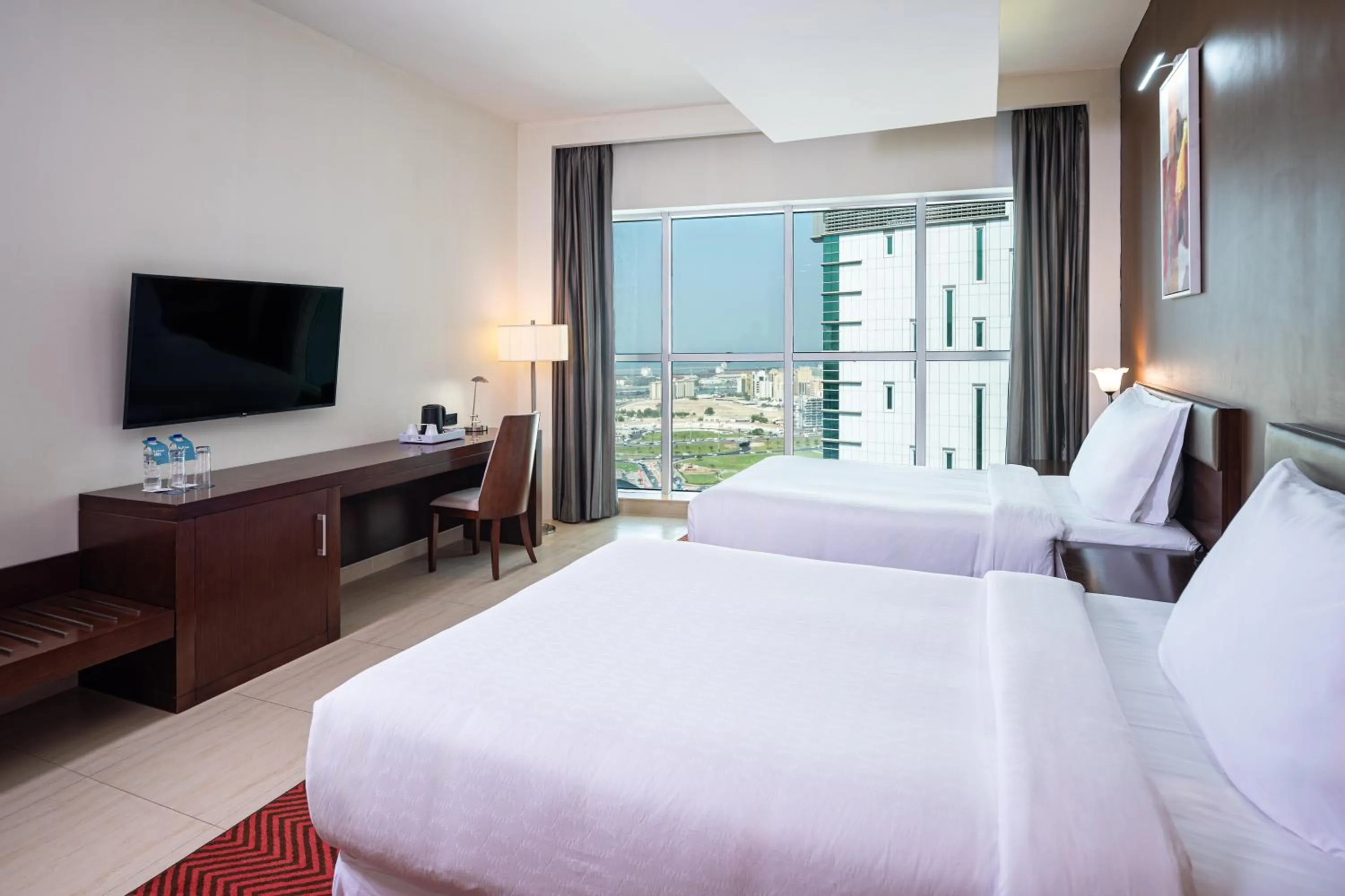 Bed in Four Points by Sheraton Sharjah