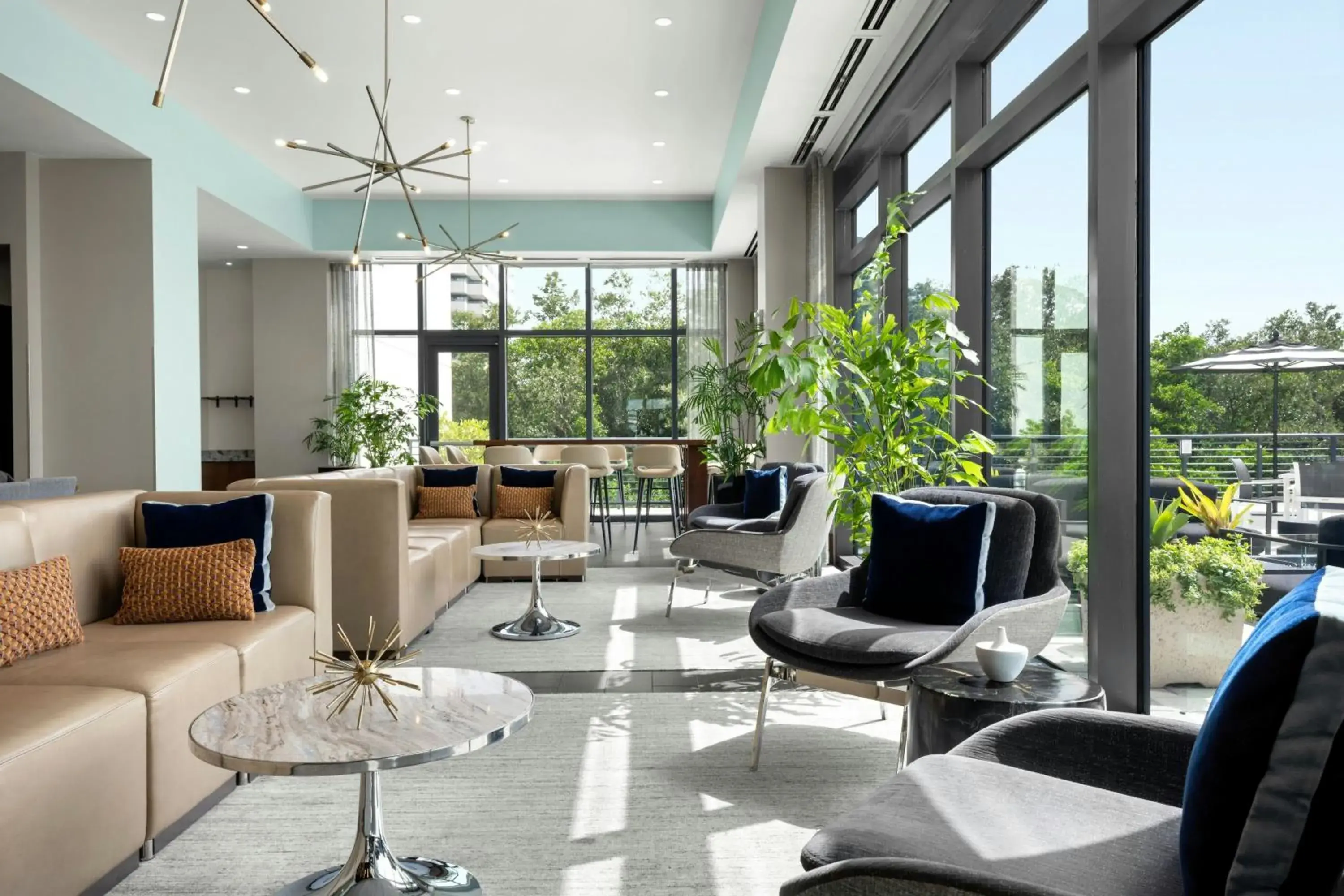 Lobby or reception in The CURRENT Hotel, Autograph Collection Lobby or reception in The CURRENT Hotel, Autograph Collection