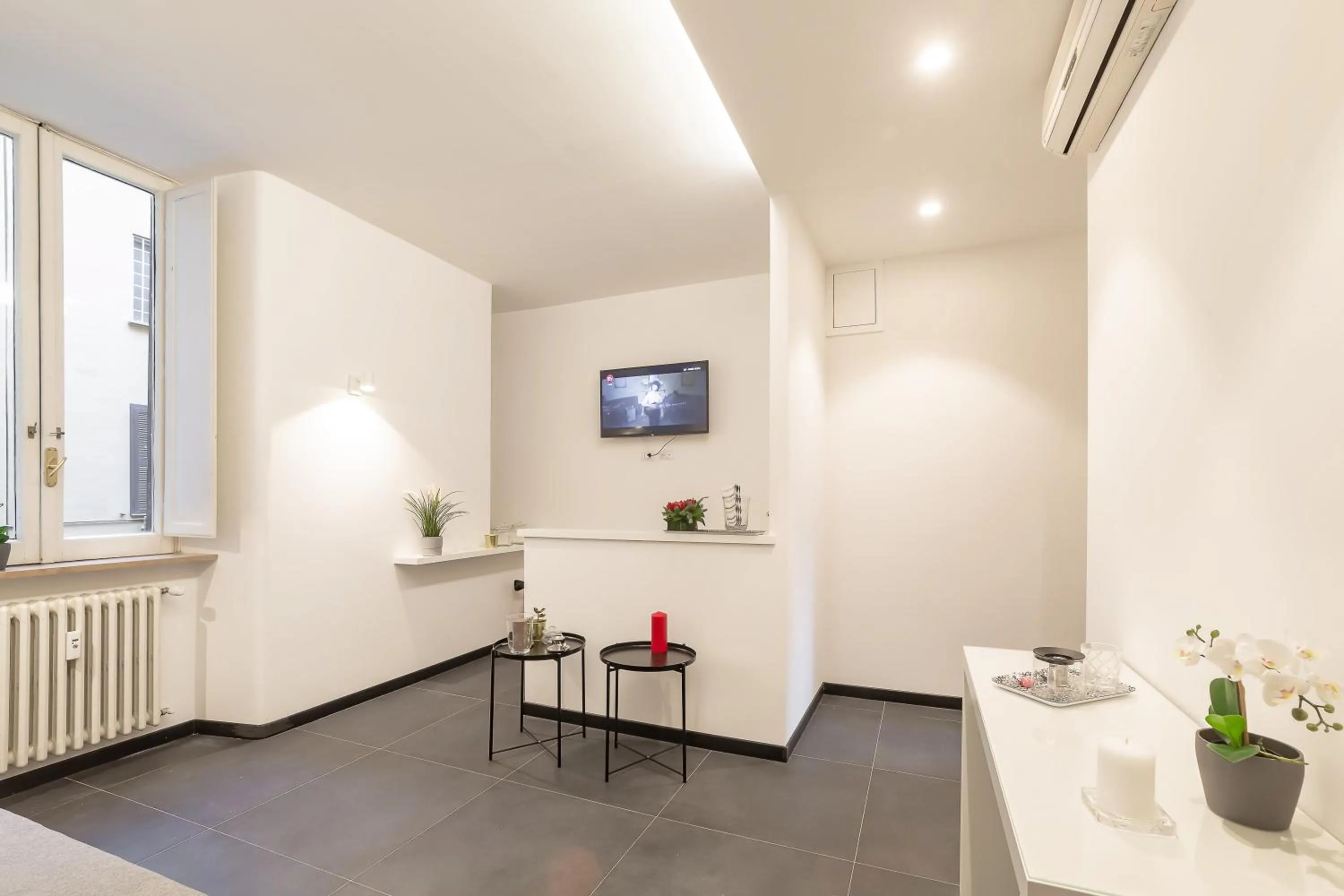 Communal lounge/ TV room in Lombardia40 Luxury Suites