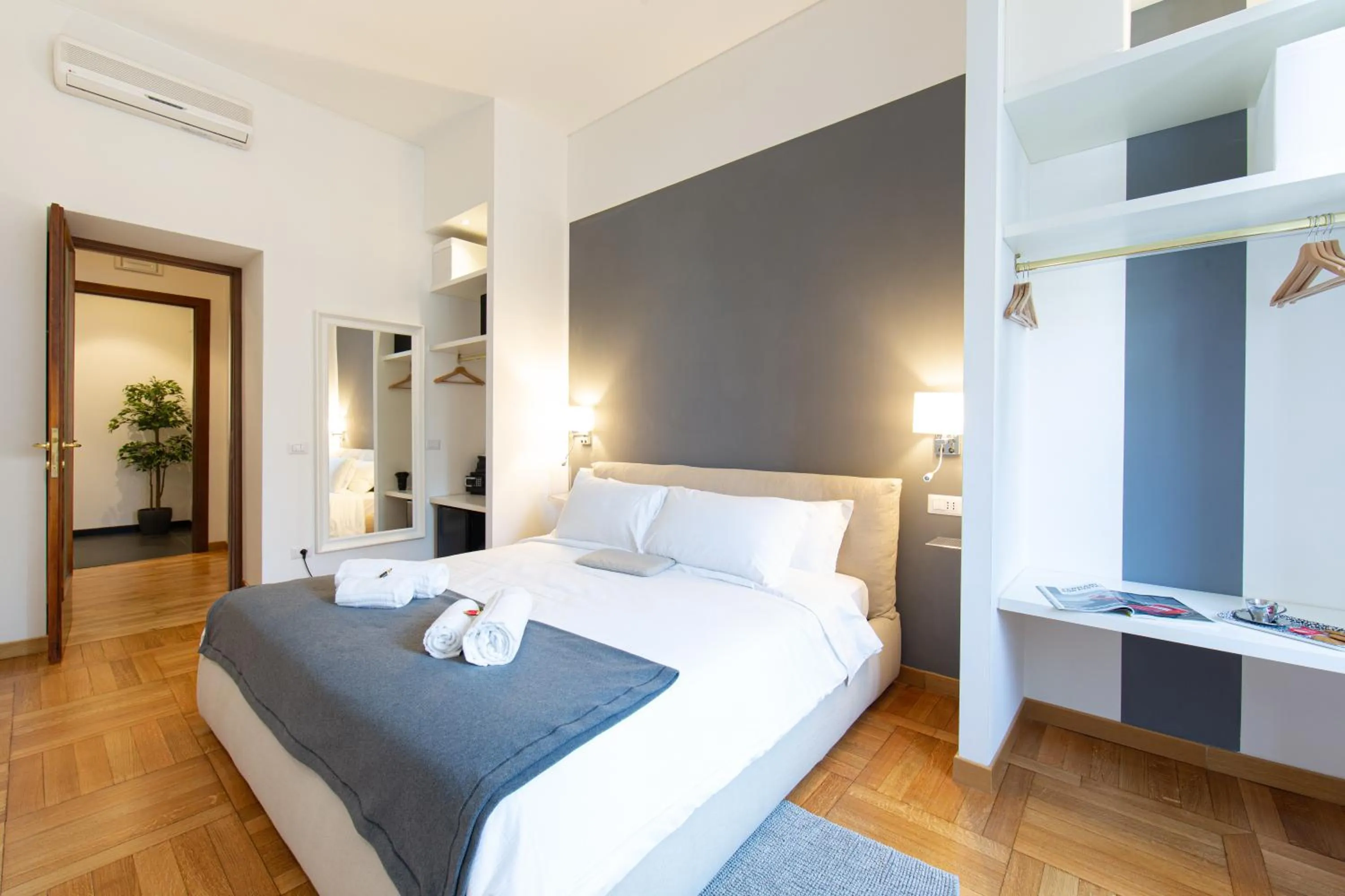 Bed in Lombardia40 Luxury Suites