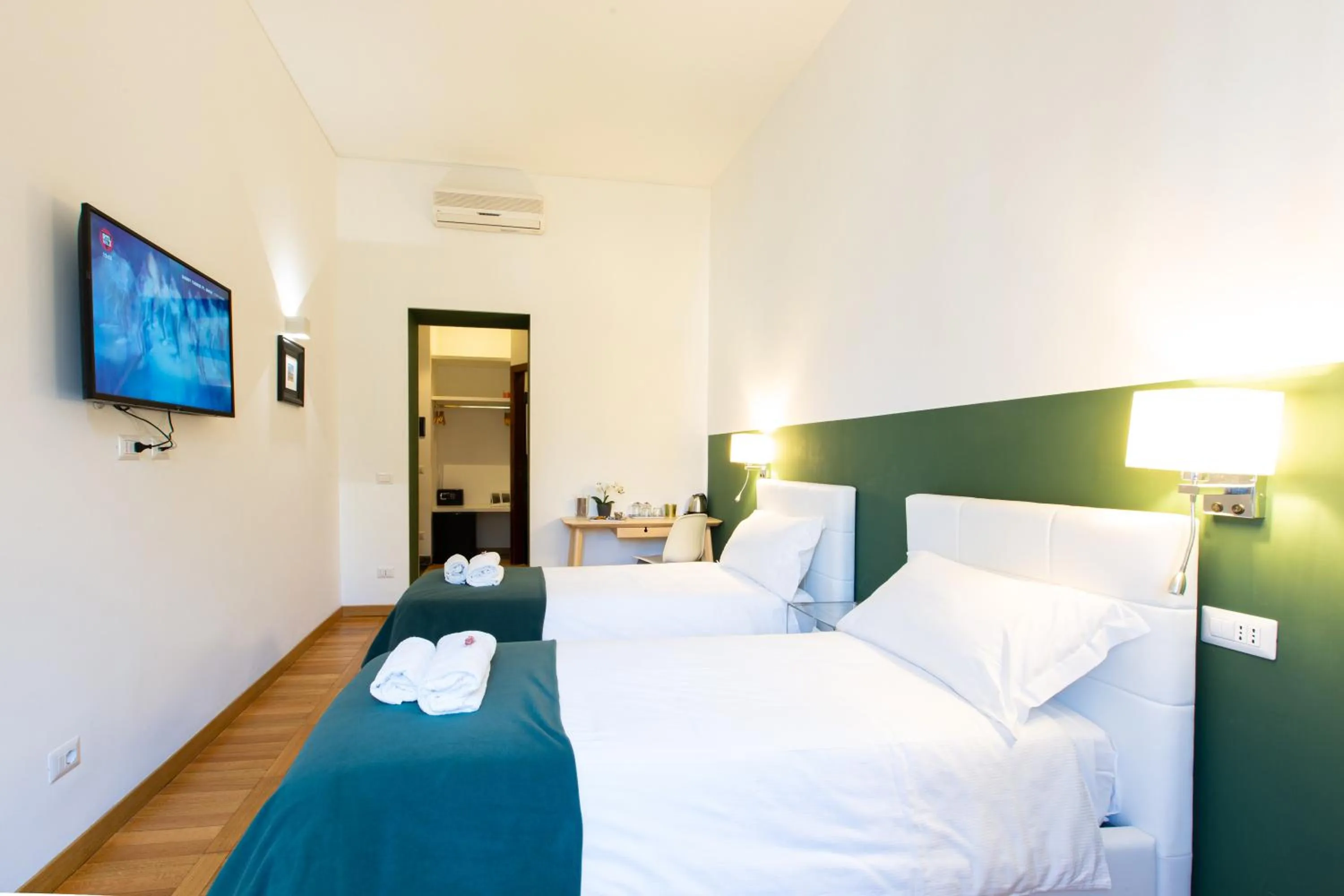 Bed in Lombardia40 Luxury Suites