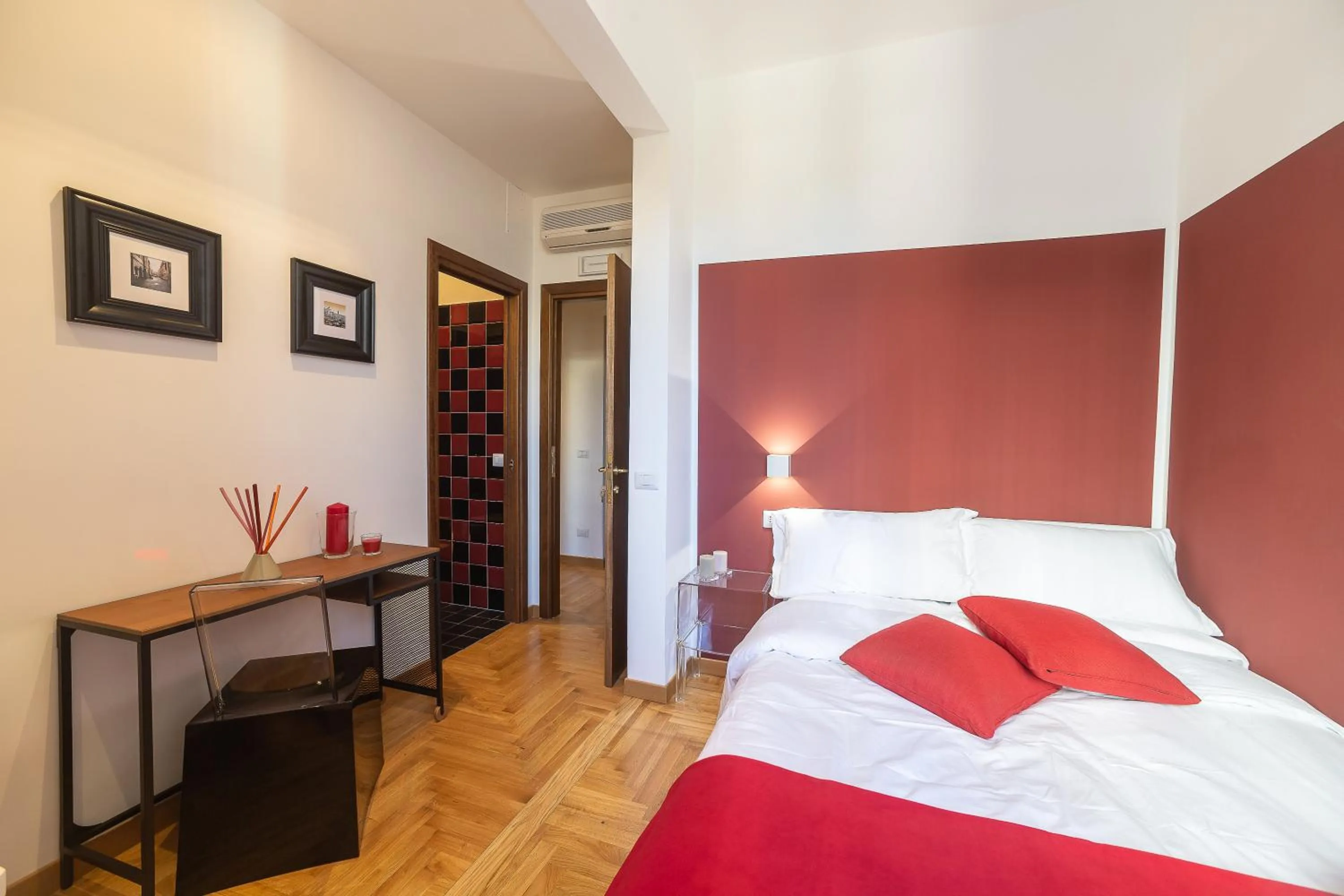 Bed in Lombardia40 Luxury Suites