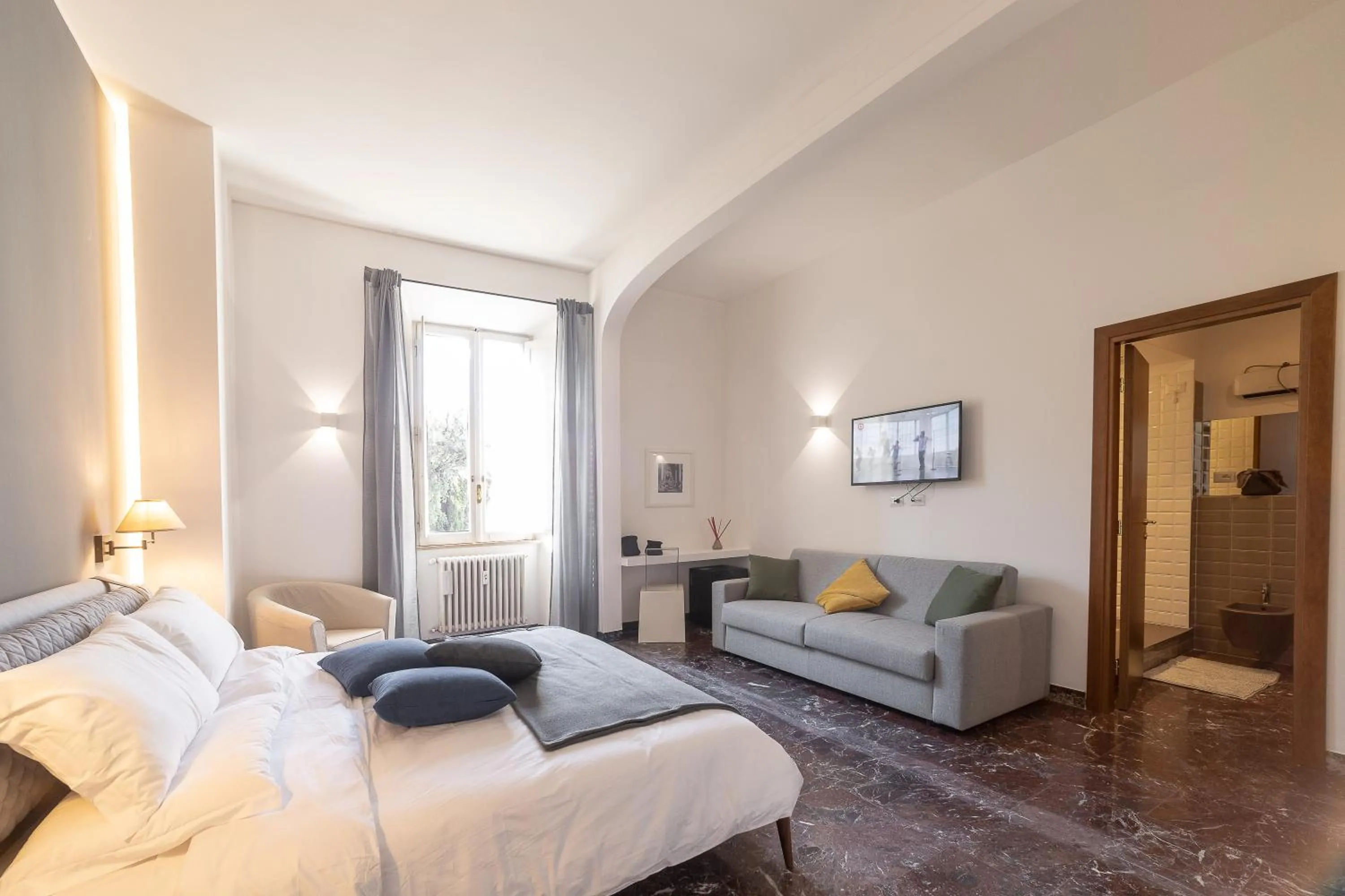 Bed in Lombardia40 Luxury Suites