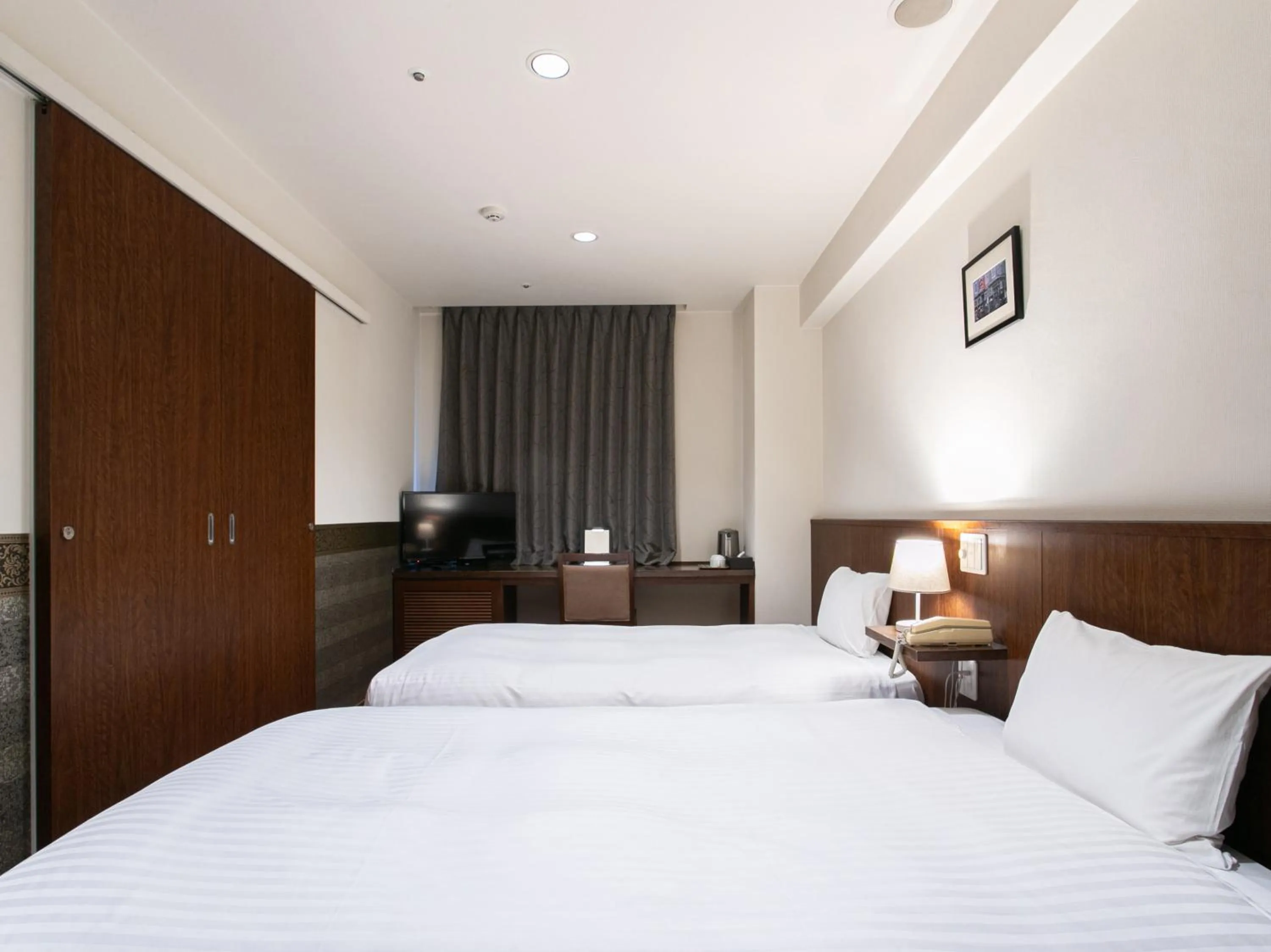 Photo of the whole room, Bed in Sutton Hotel Hakata City