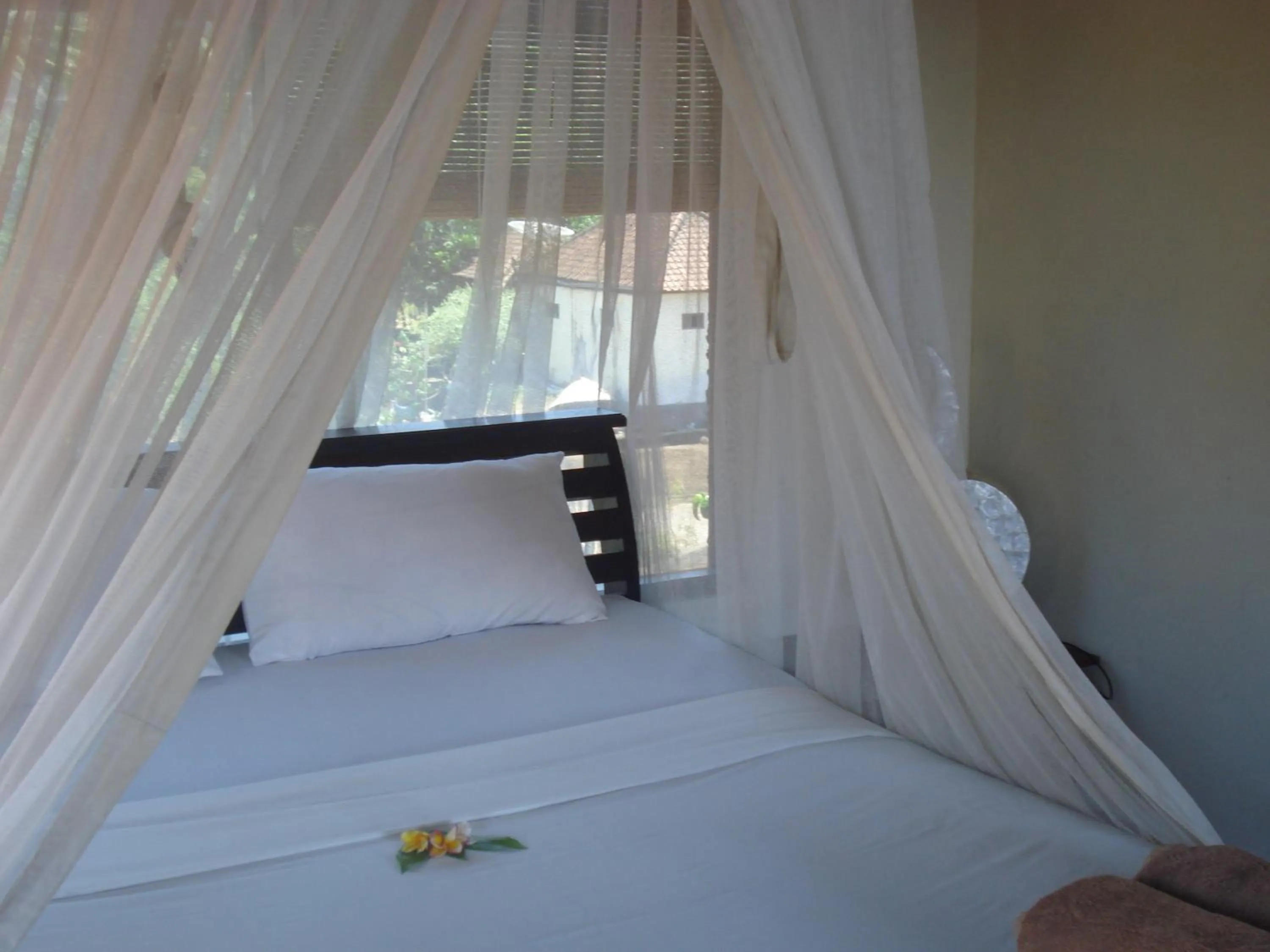 Bed in Bulih Beach Bungalows