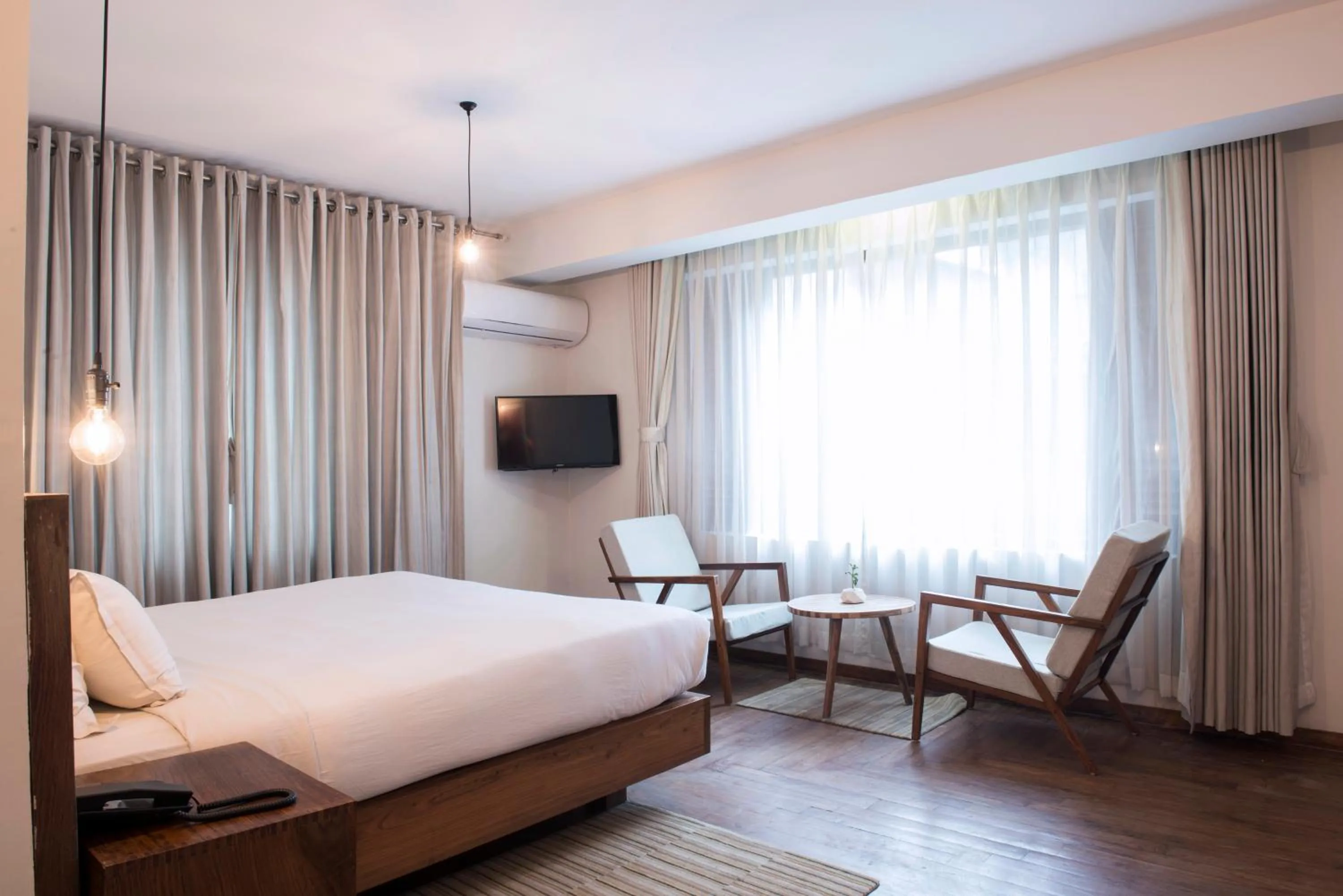 Bed in Potala Guest House