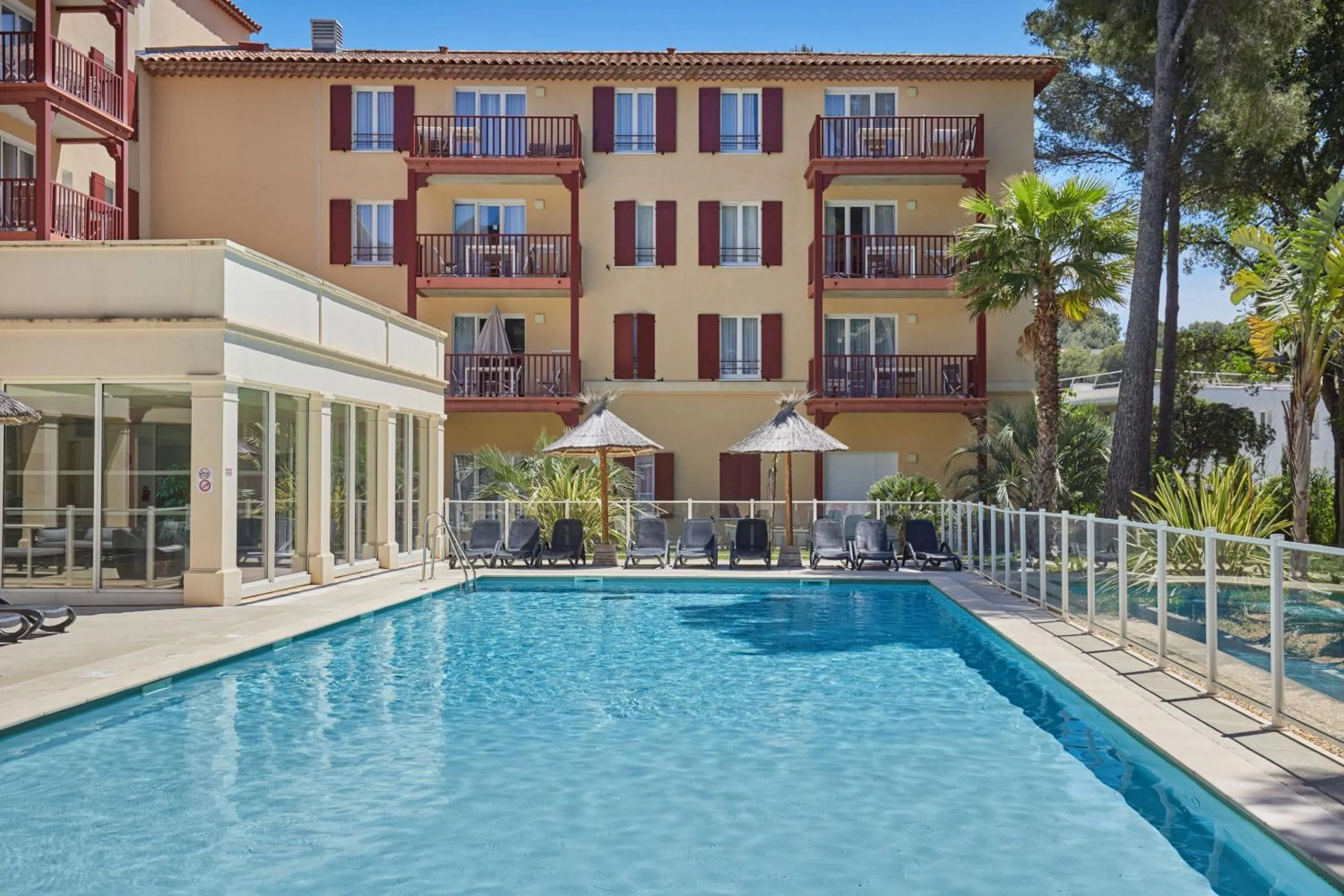 Swimming pool in Odalys Résidence et Spa Les Canissons