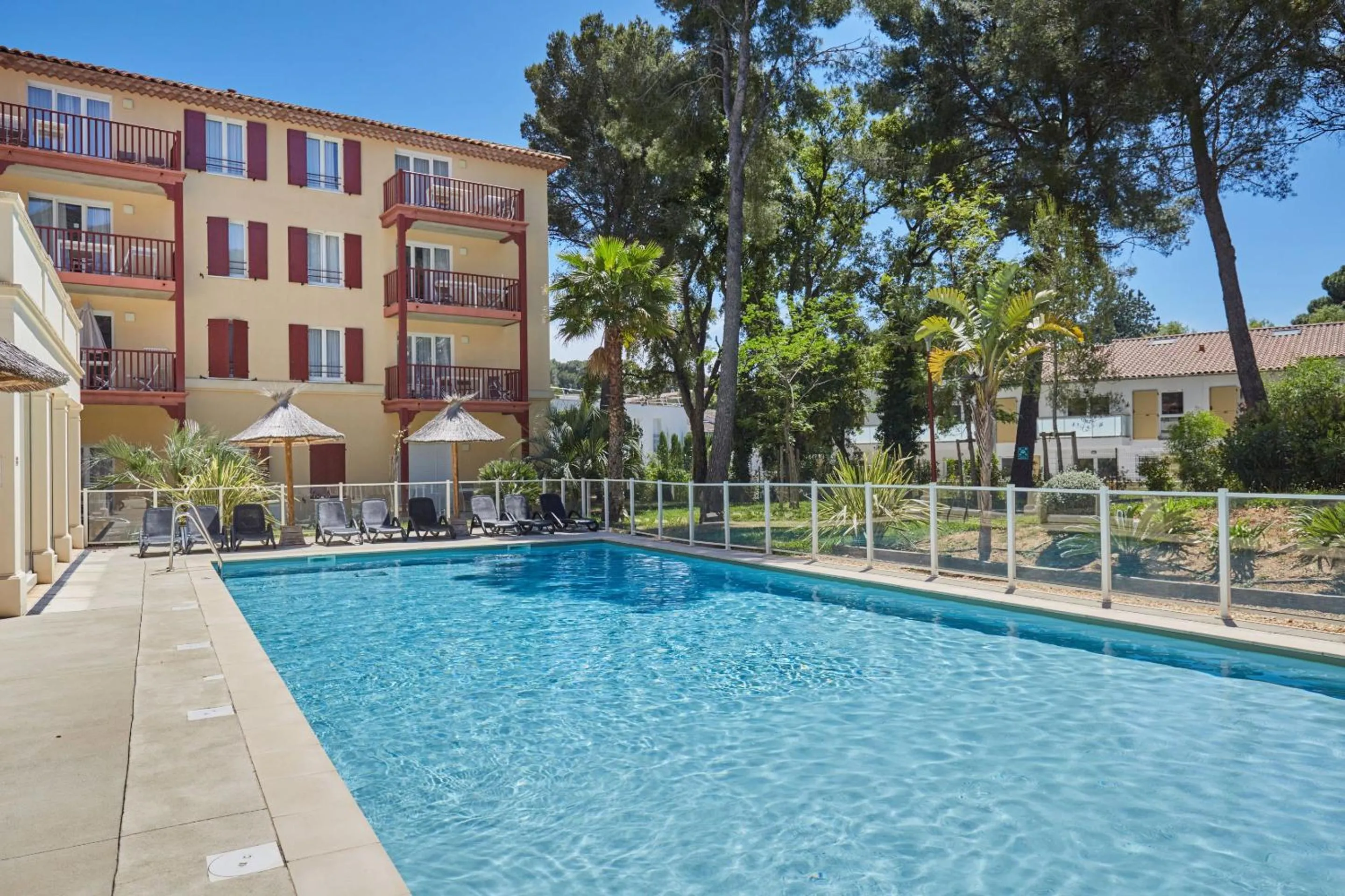 Swimming pool in Odalys Résidence et Spa Les Canissons
