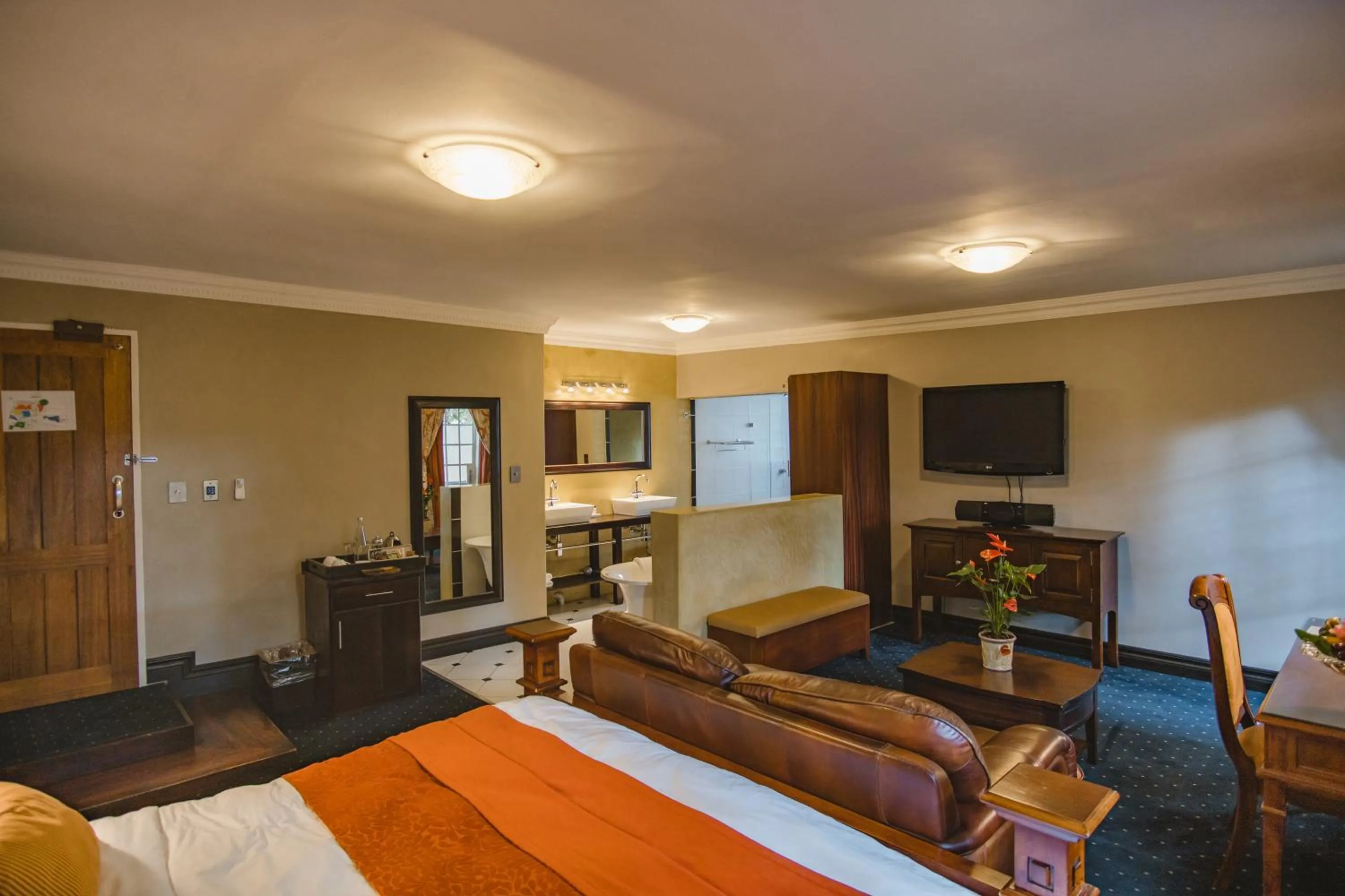 Shower, Bed in Village Ridge Stays
