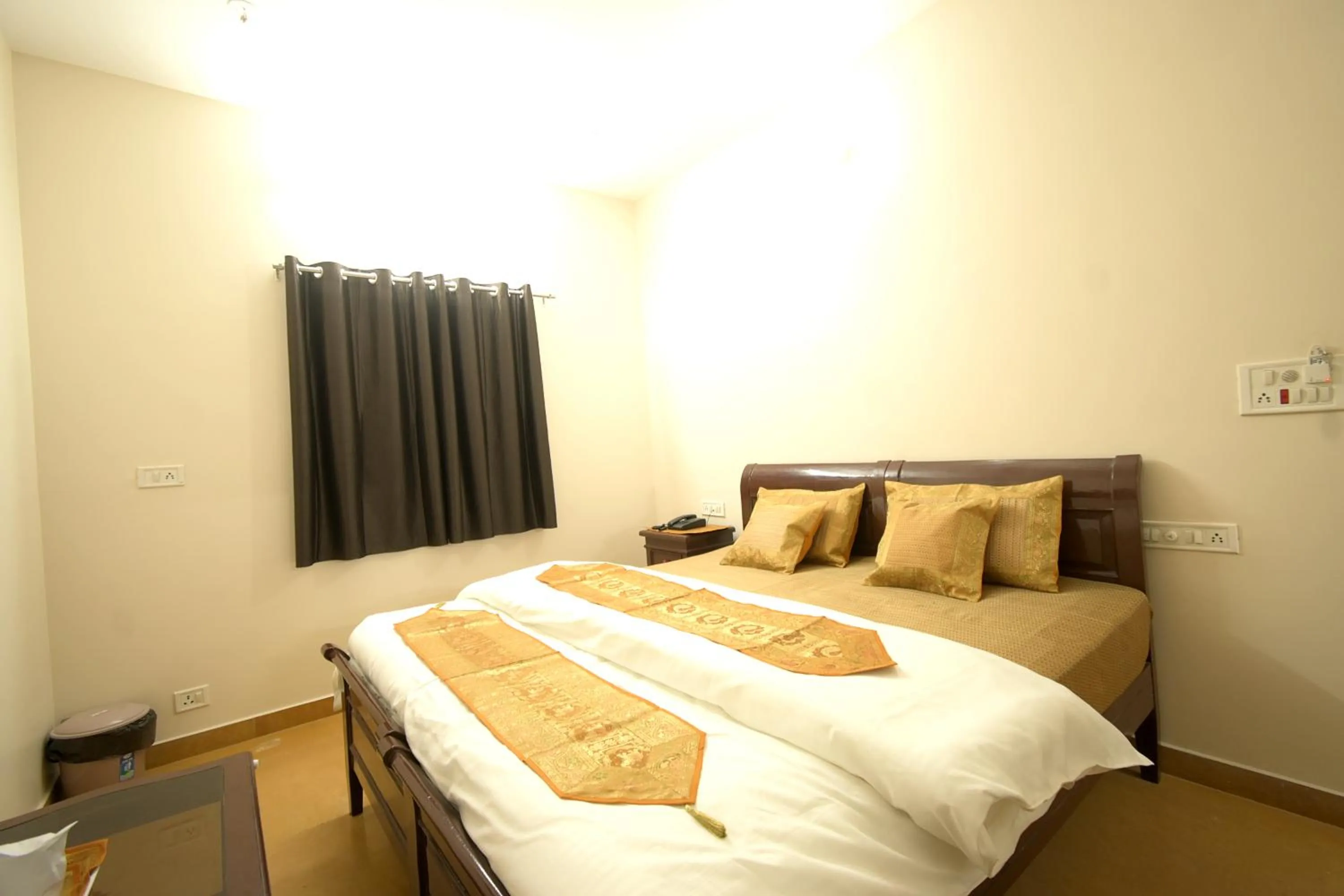 Bed in Hotel Sanjay Villas