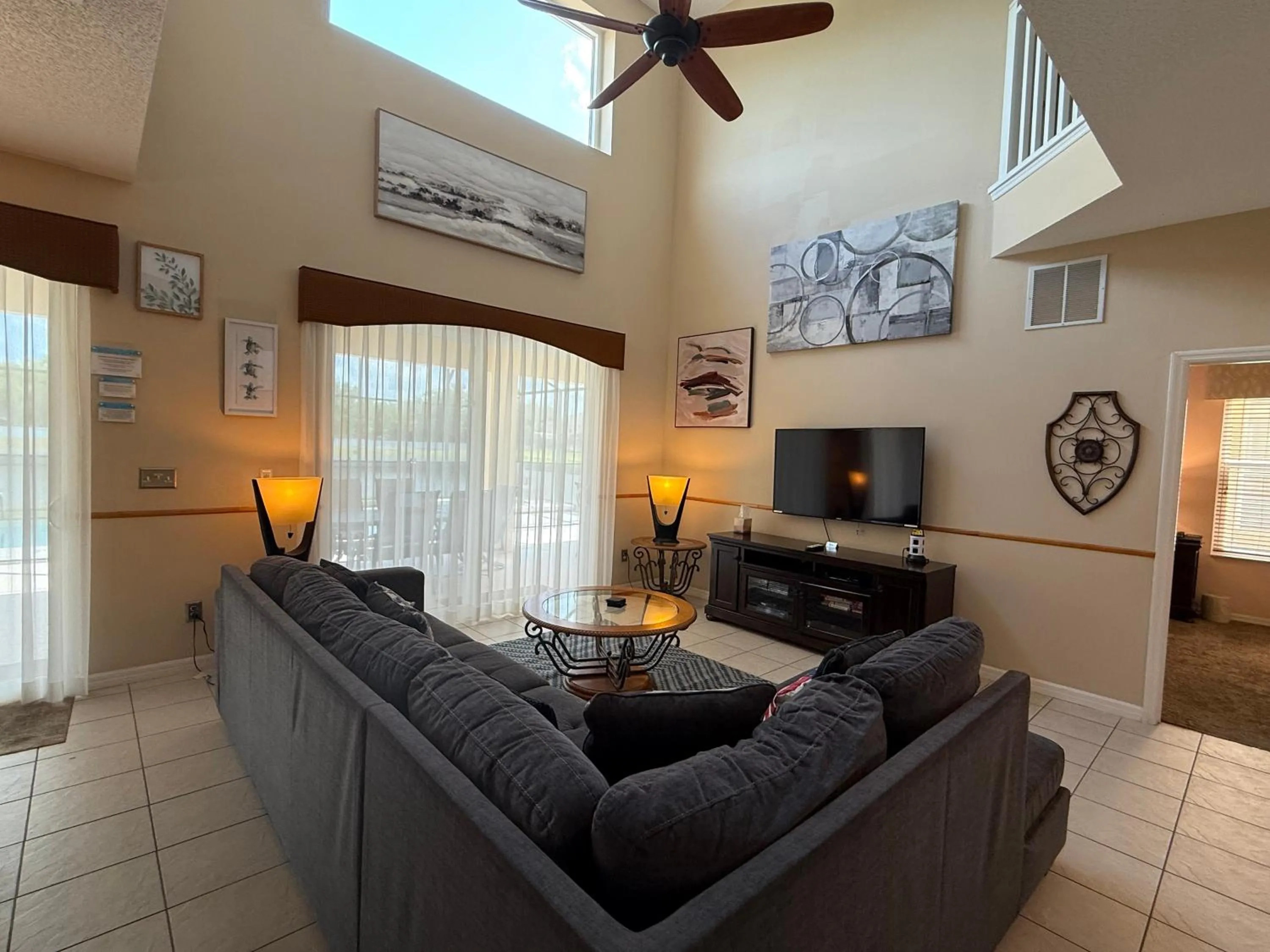 Communal lounge/ TV room in Seasons Villa 6 bedrooms, 4 masters and water view