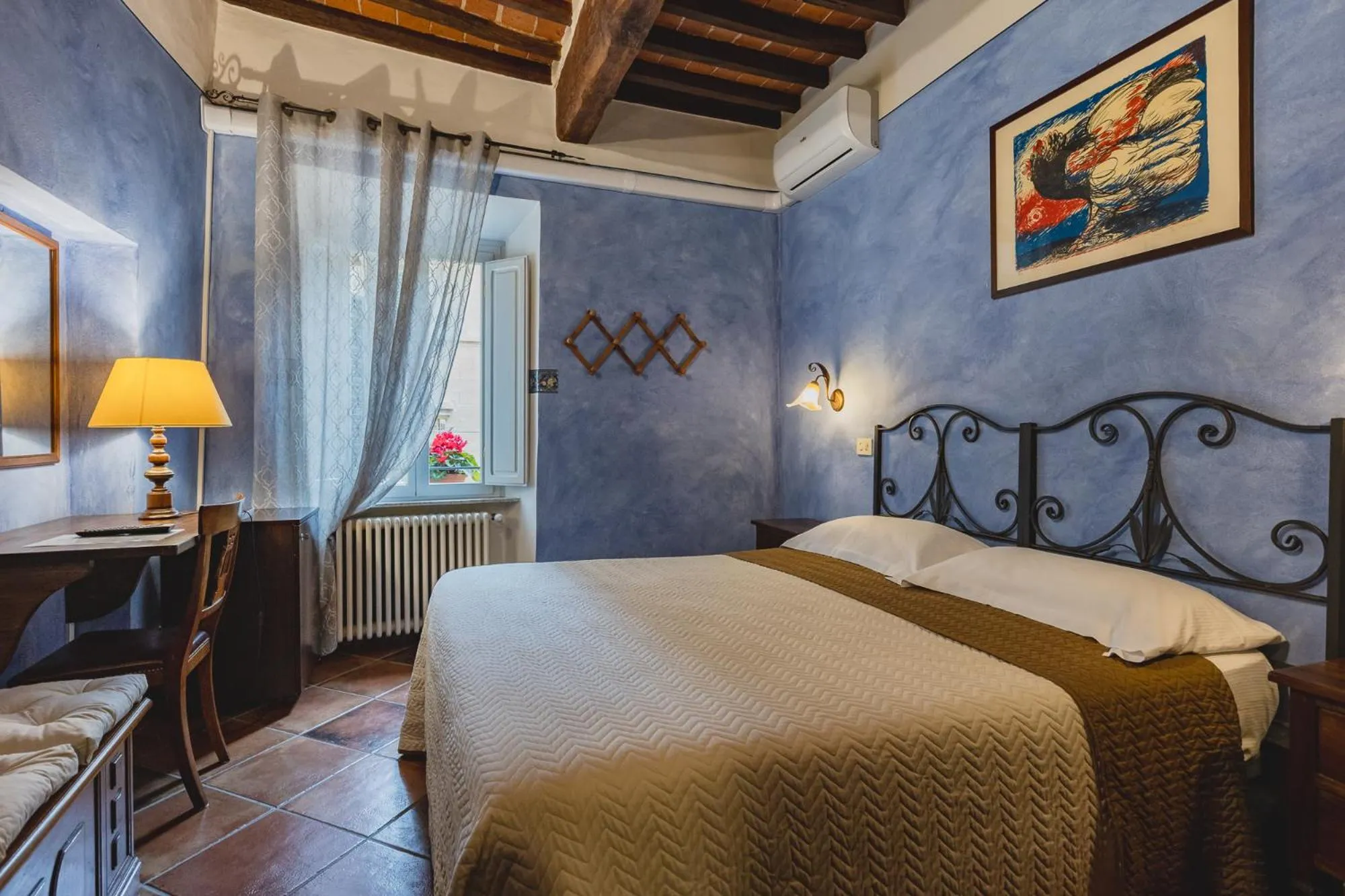 Bed in Meublè Evoè