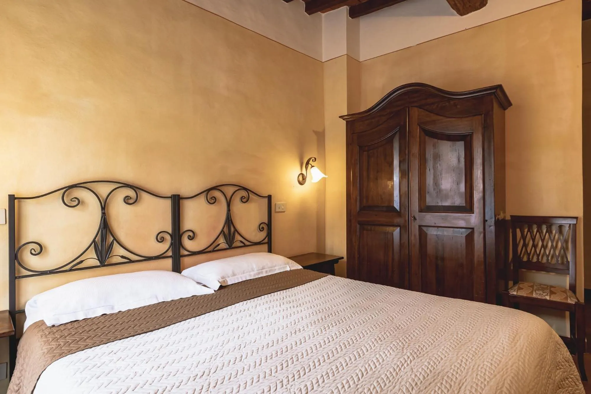 Bed in Meublè Evoè