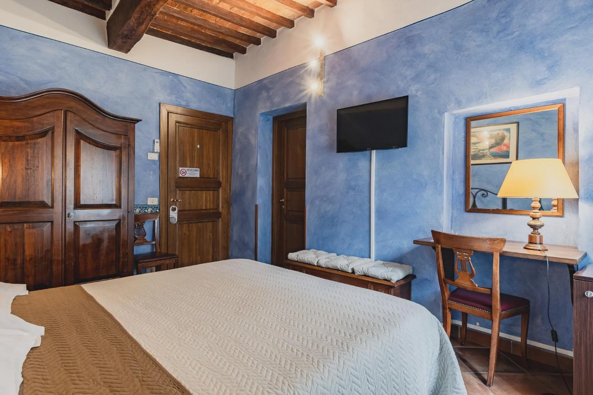 Bed in Meublè Evoè