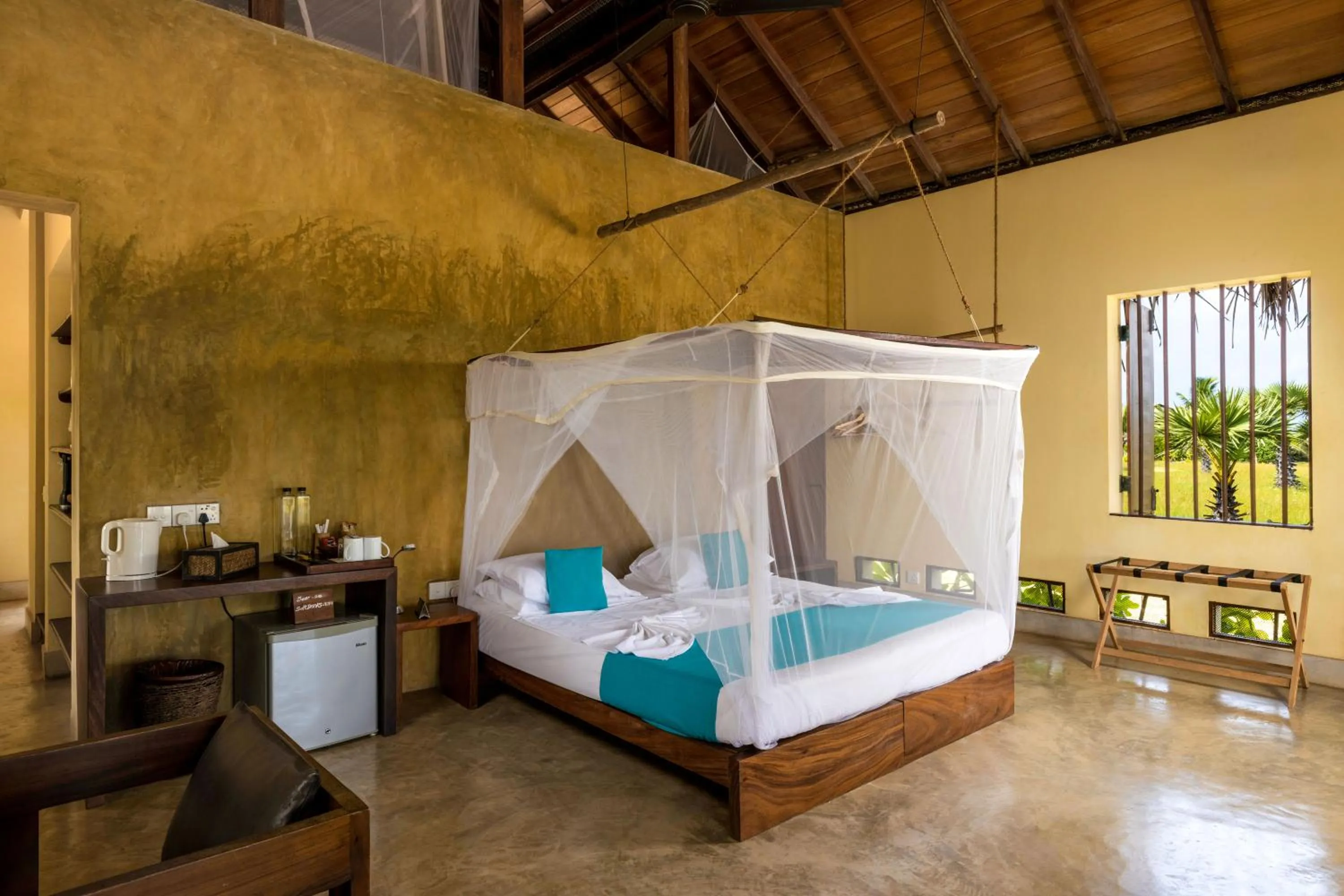 Bed in Elements Beach & Nature Resort