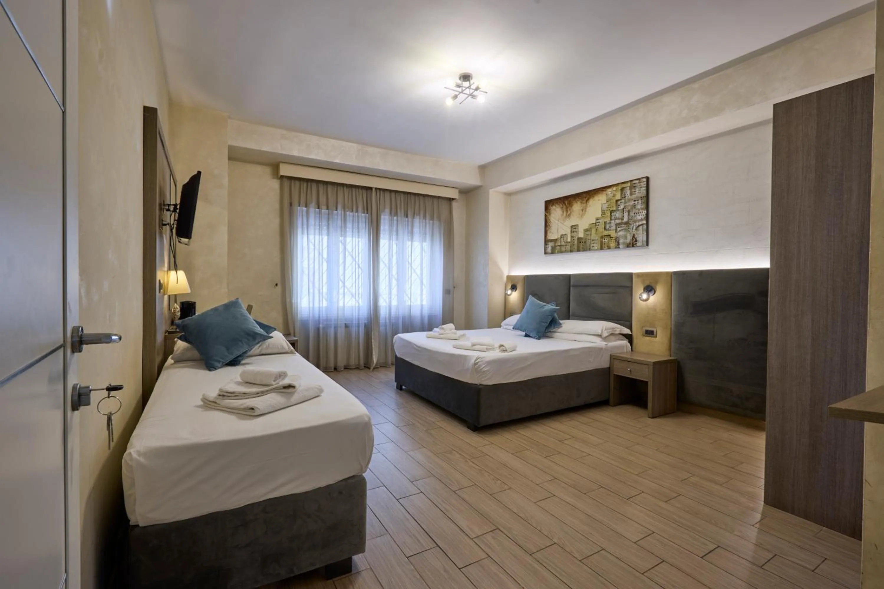 Photo of the whole room, Bed in Relais Tiburtina