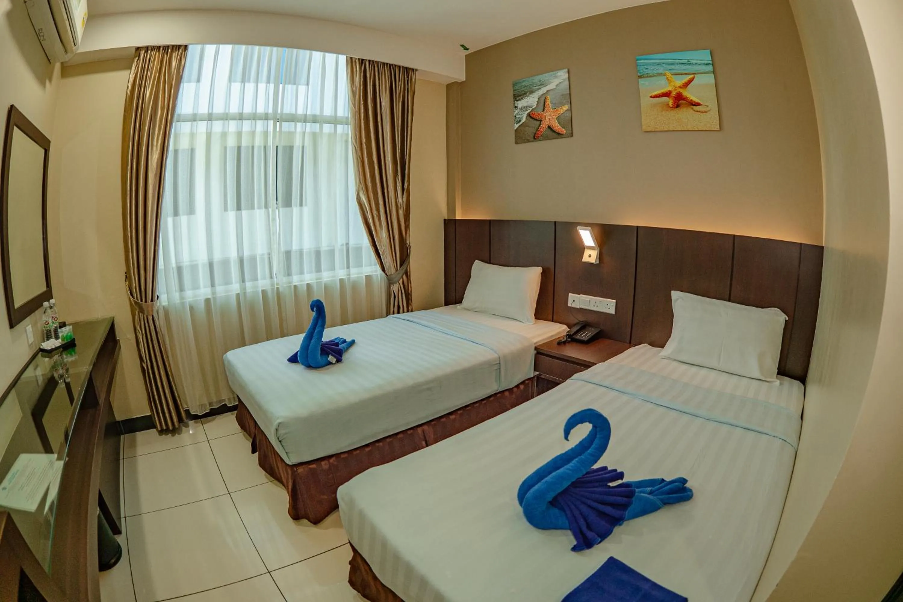 Bed in Wave View Hotel